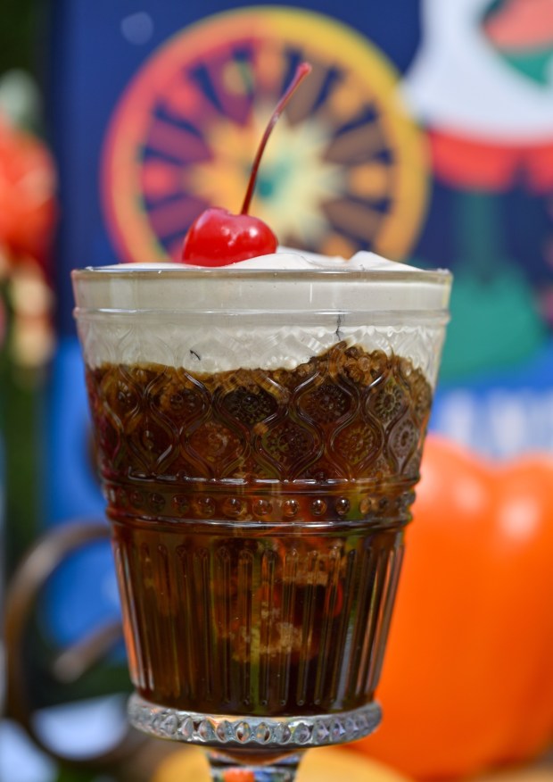 Cherry Cola Cold Brew; Joffrey's Coffee 70th Anniversary Blend, oat milk and vanilla crème and cherry syrups topped with a cherry cola cold foam and a maraschino cherry at the LA Style festival marketplace food booth during the California Food & Wine Festival inside California Adventure running March 6 through April 27, 2026. Photographed on Friday, March 6, 2026. (Photo by Jeff Gritchen, Orange County Register/SCNG)