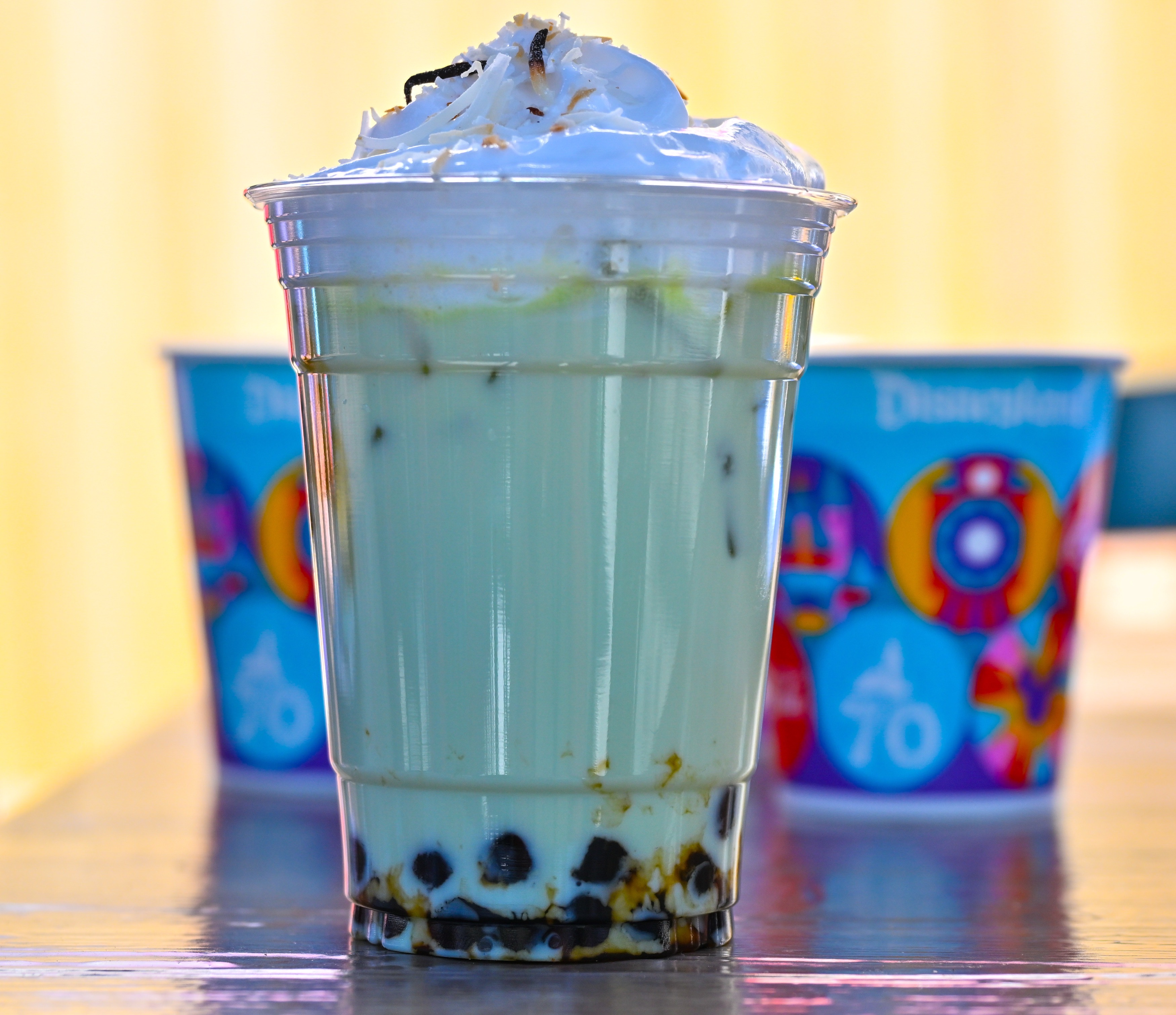 Pandan Milk Tea; oat milk and toasted coconut with brown...