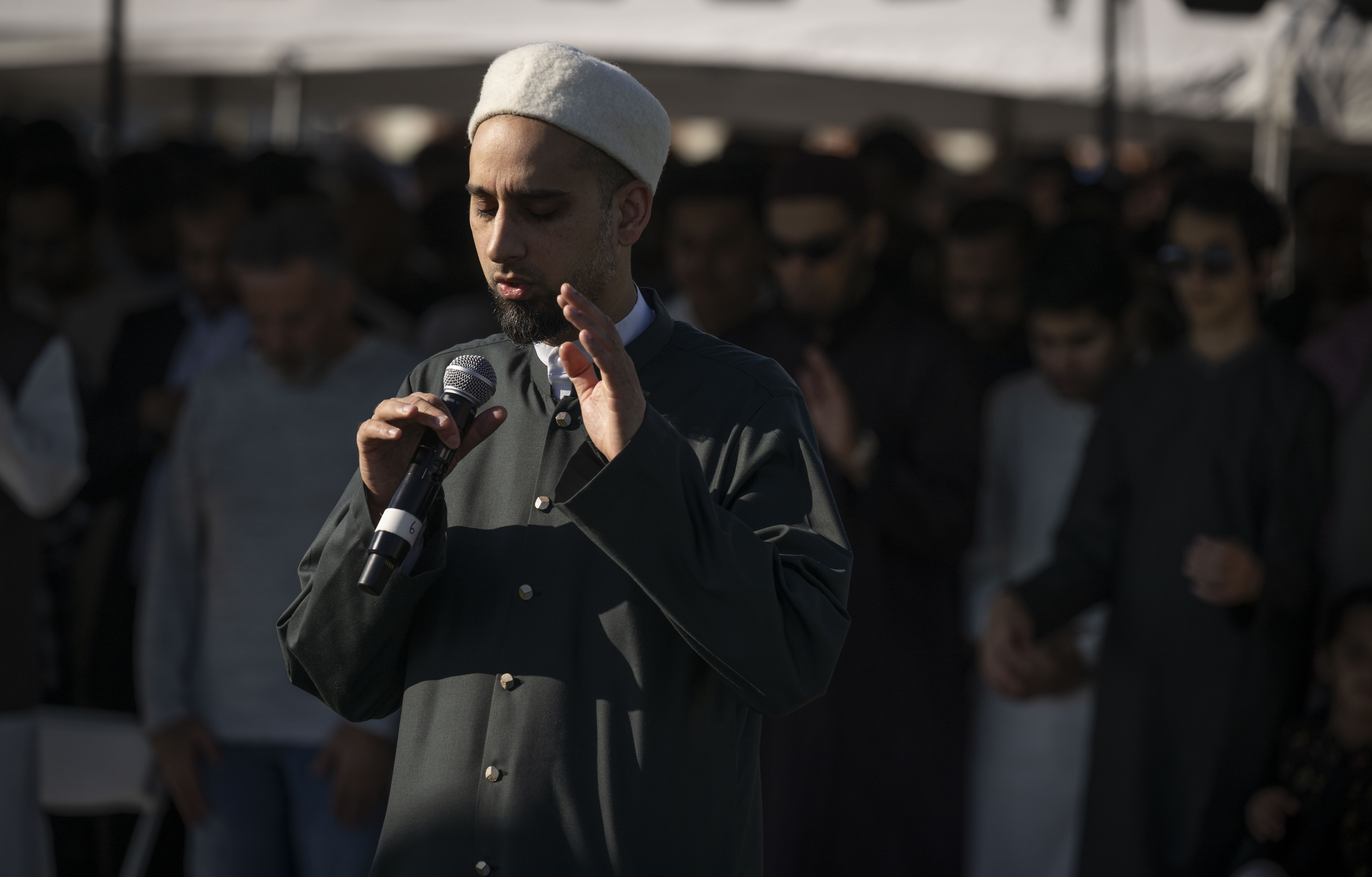 Shaykh Abdullah Misra leads prayers during an Eid ul-Fitr celebration...