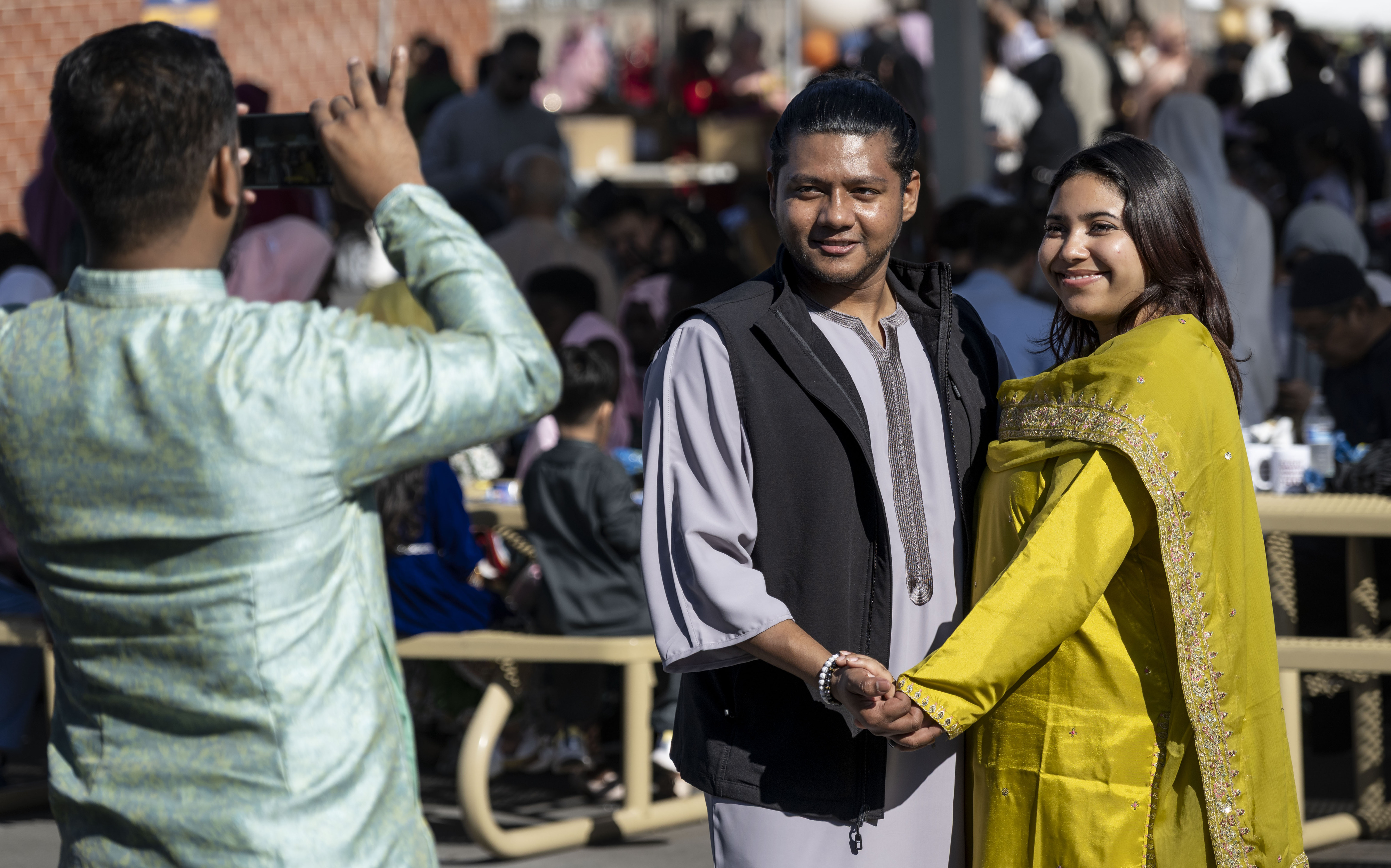 Mehpab Joy and Khan Kashfia have their photo taken by...