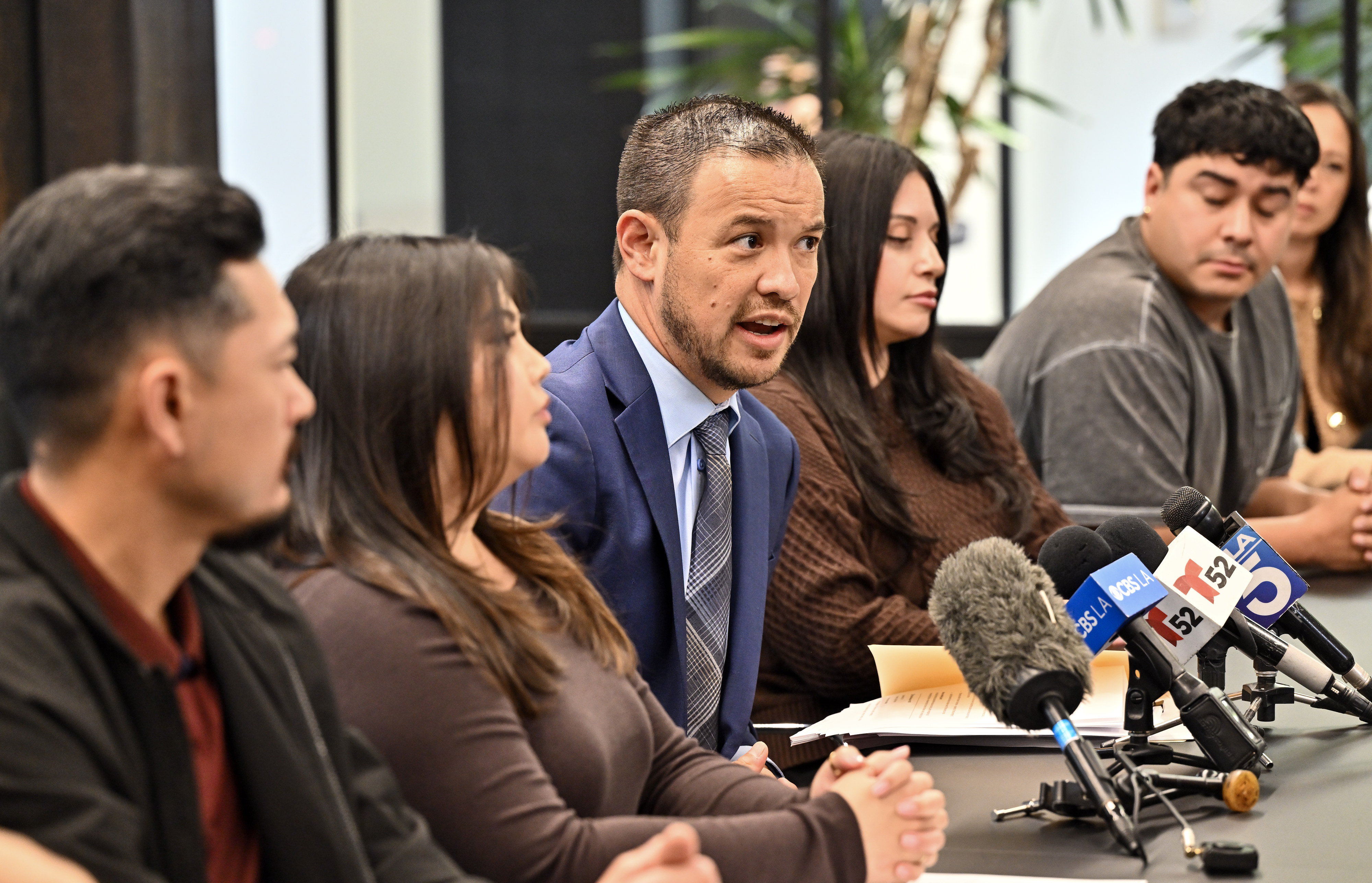 Attorney Benjamin Ikuta speaks to the media during a press...