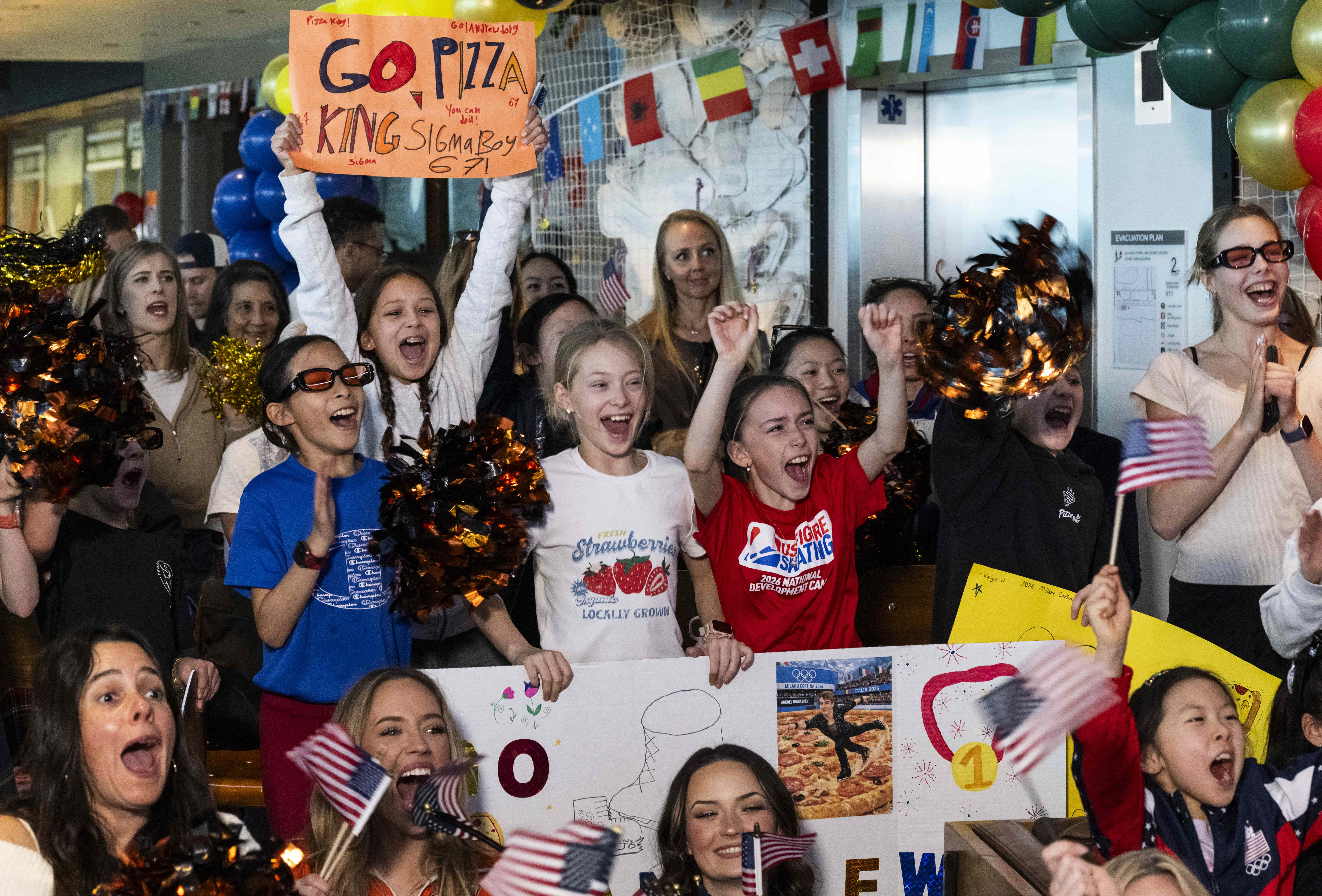 Fans at Great Park Ice in Irvine, CA cheer for...