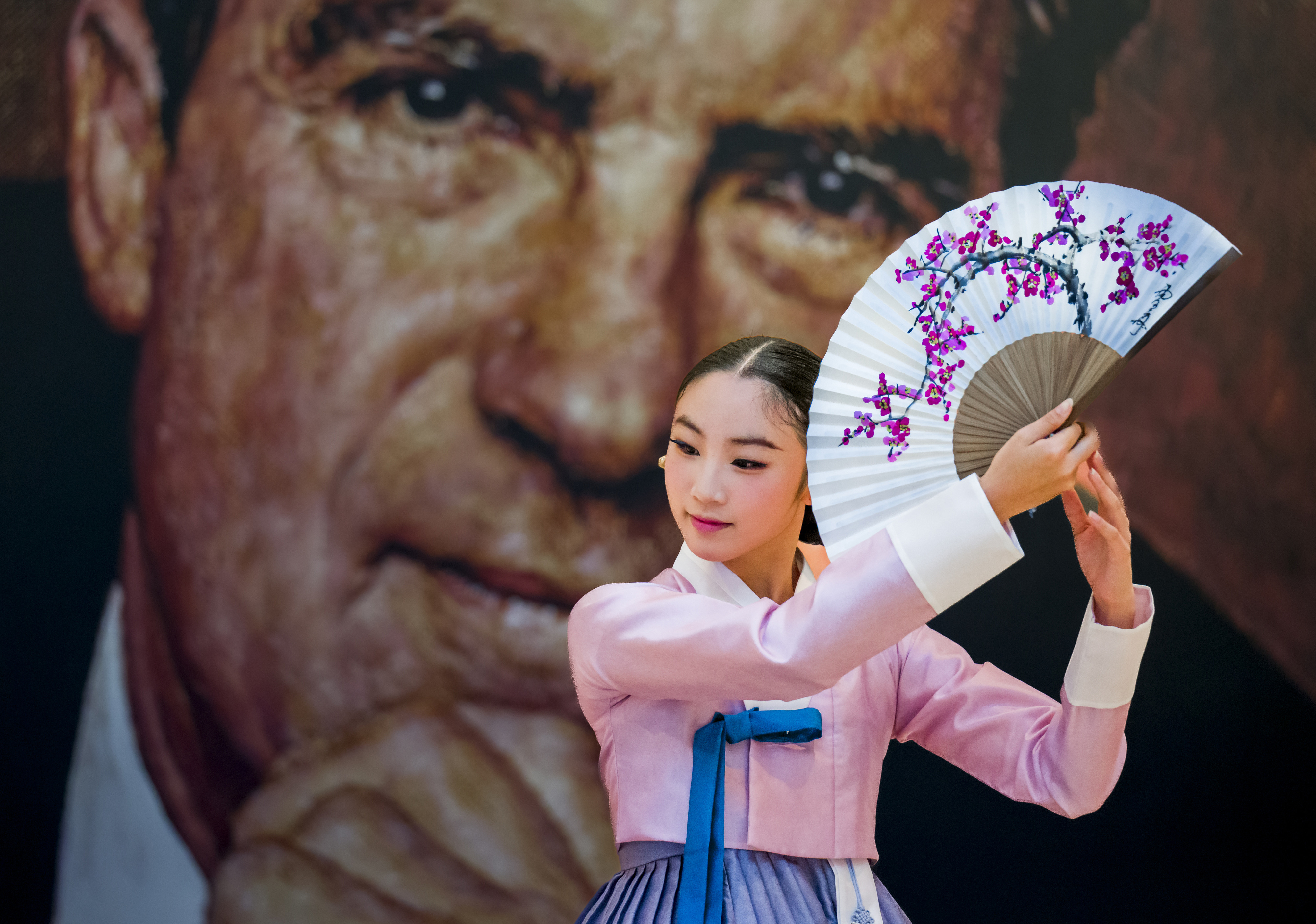 Mandy Hur, 15, performs a traditional Korean dance in the...