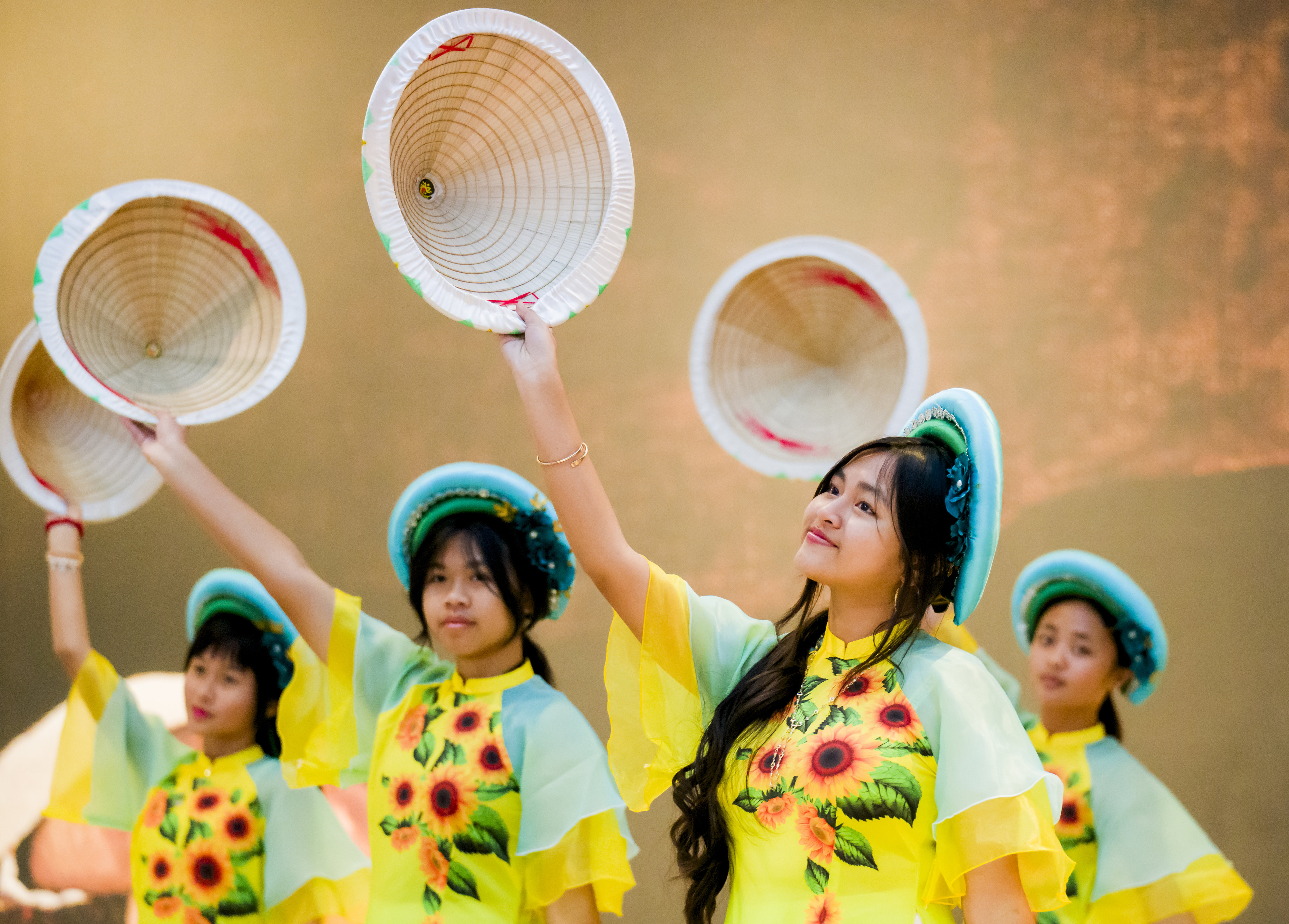 Traditional dancers perform in the lobby at the Richard Nixon...