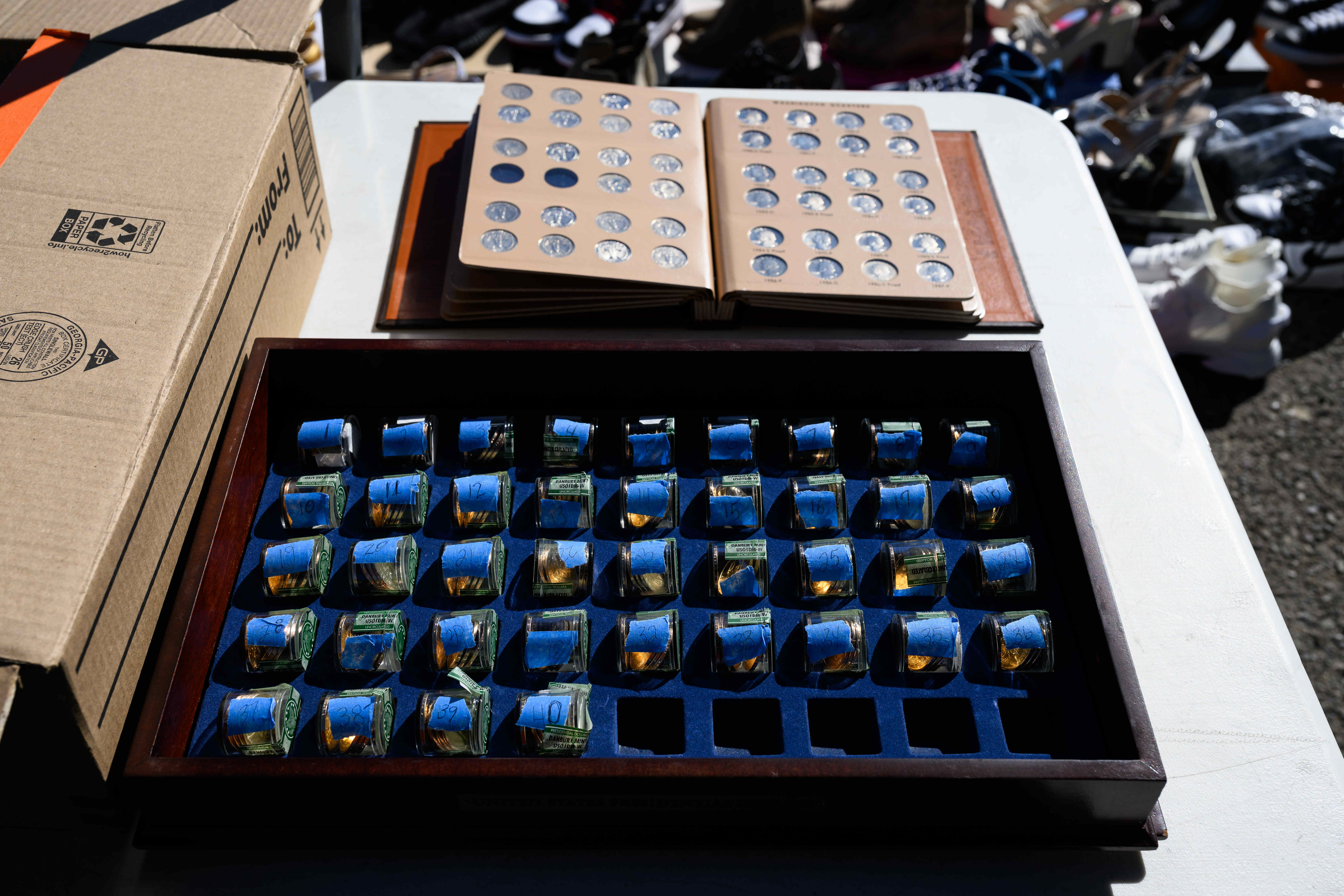 A coin collection is seen on display during a community...