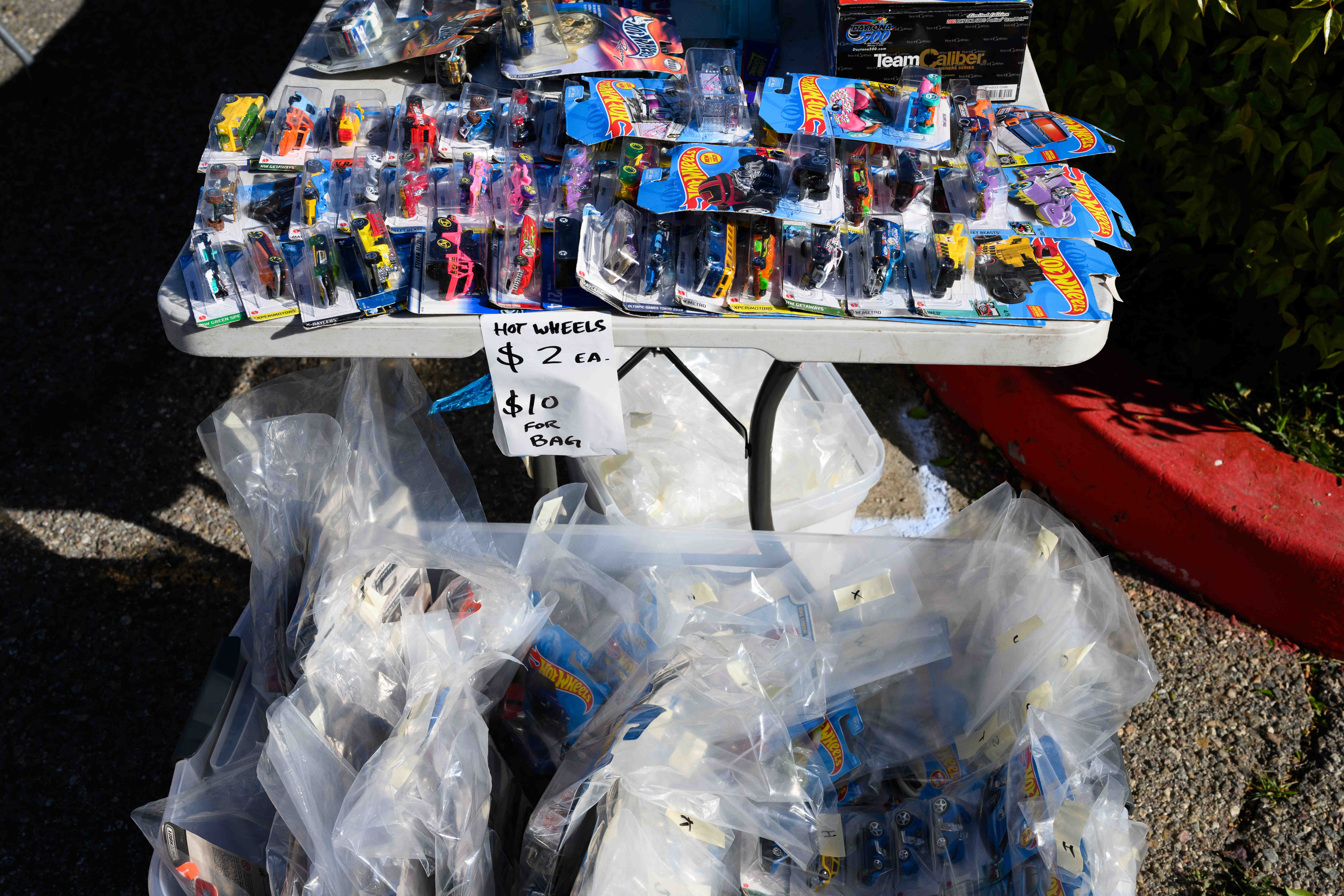 A large collection of Hot Wheels toy cars are seen...