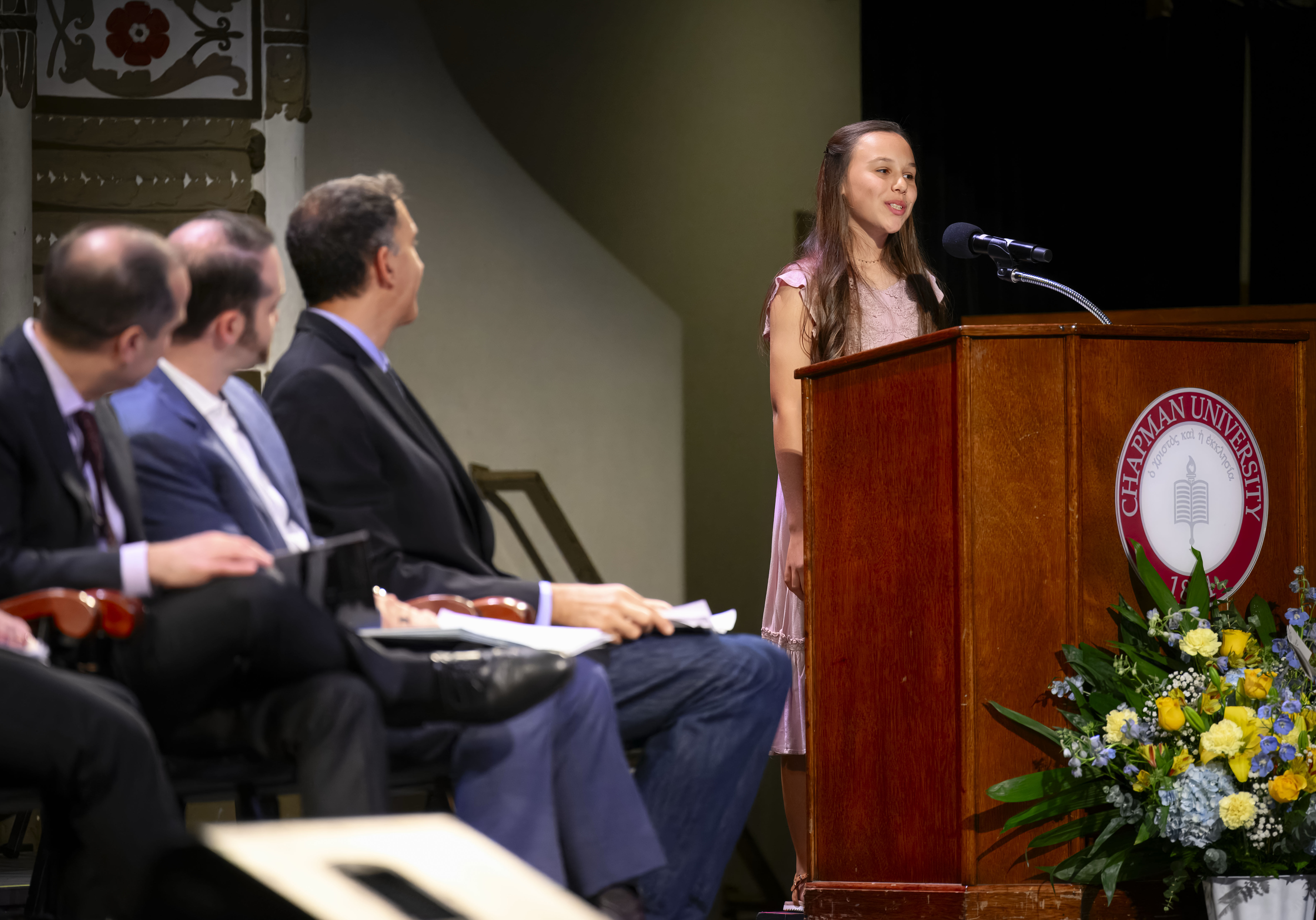 Bethel Bernier of Acaciawood Preparatory Academy in Anaheim reads her...