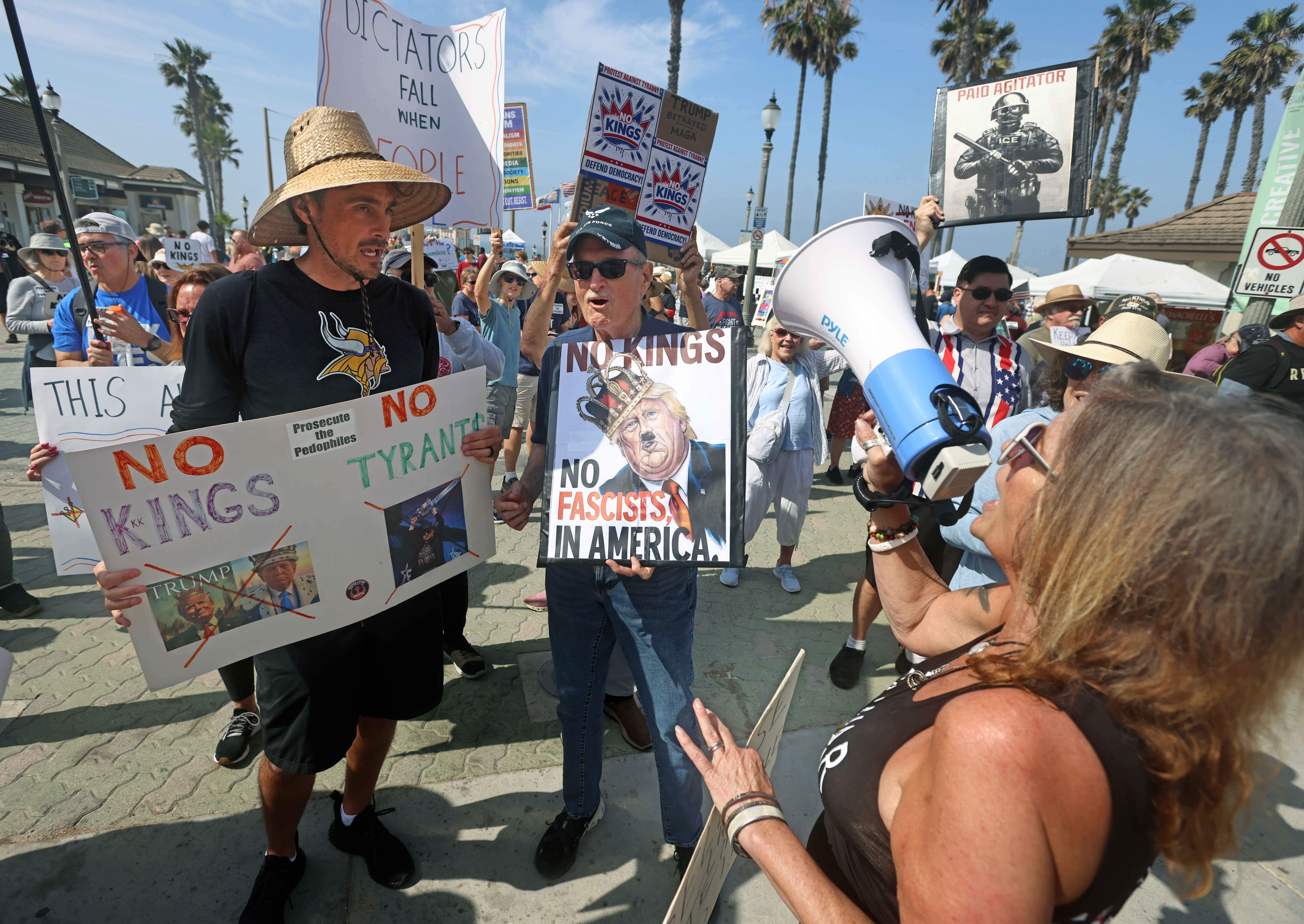 Bethany Webb, a longtime resident of Huntington Beach, shouts out...