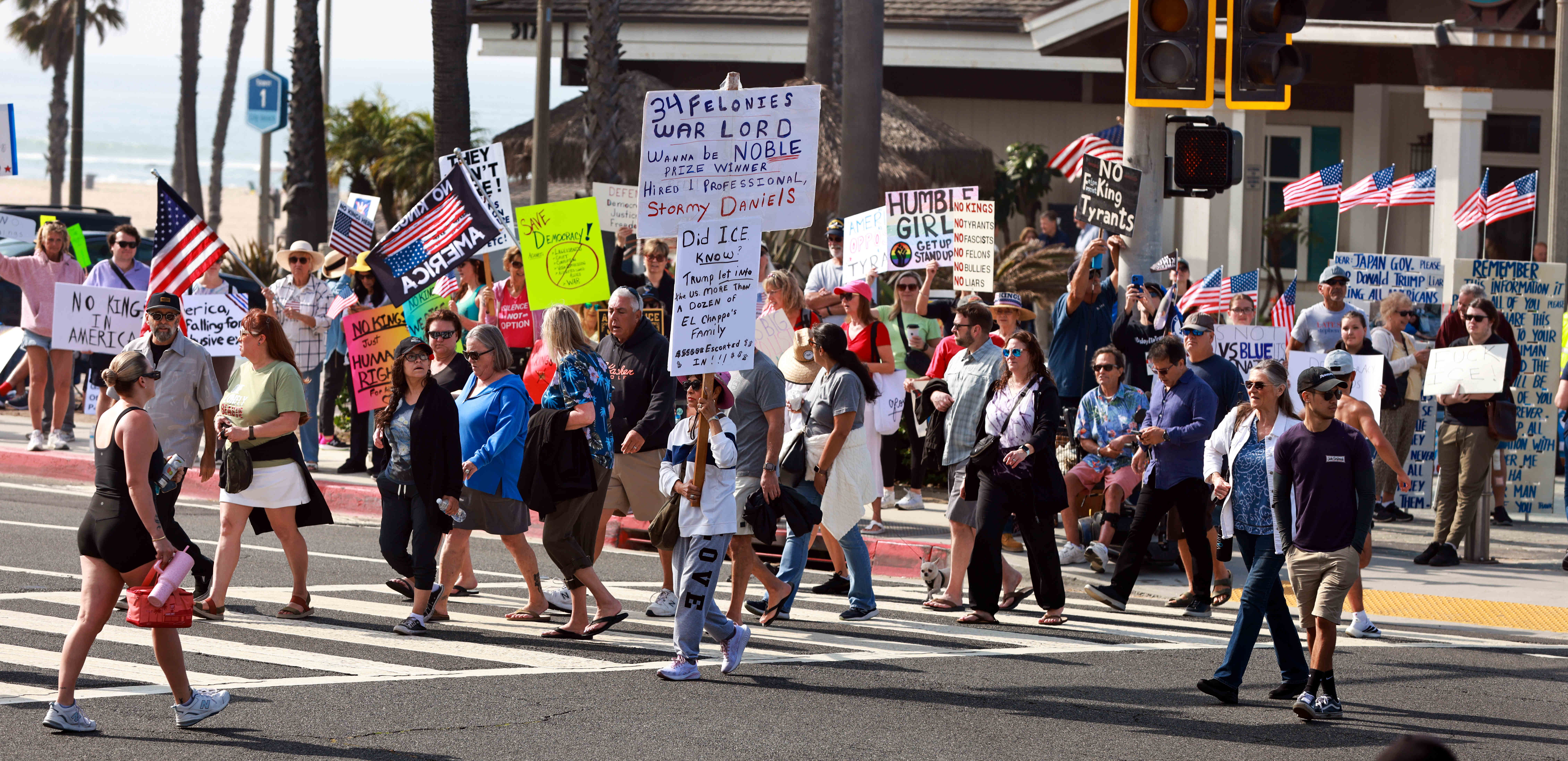 Throngs of people show up at the “No Kings” protest...