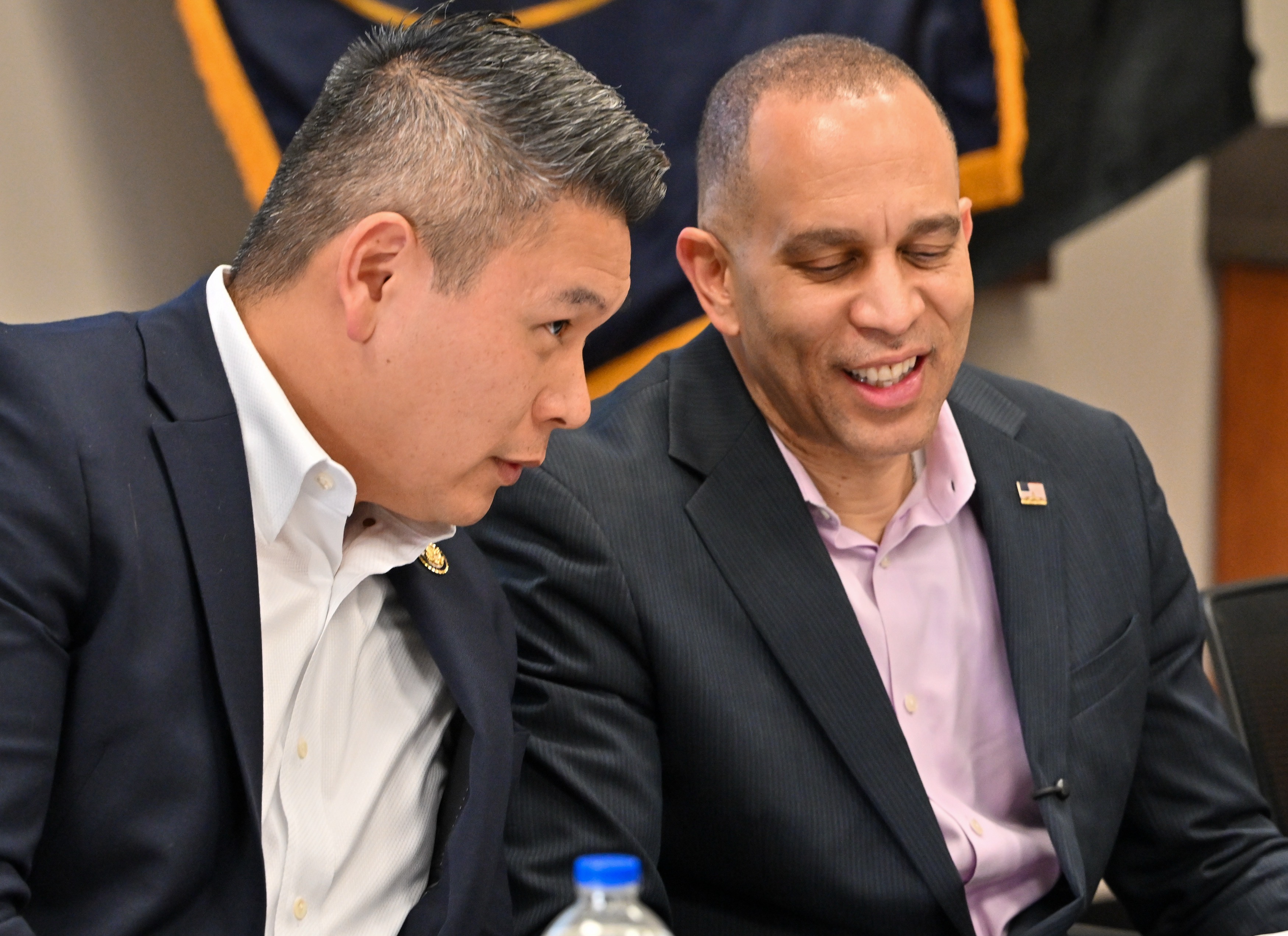 Derek Tran, D-Orange, left, chats with House Minority Leader Hakeem...