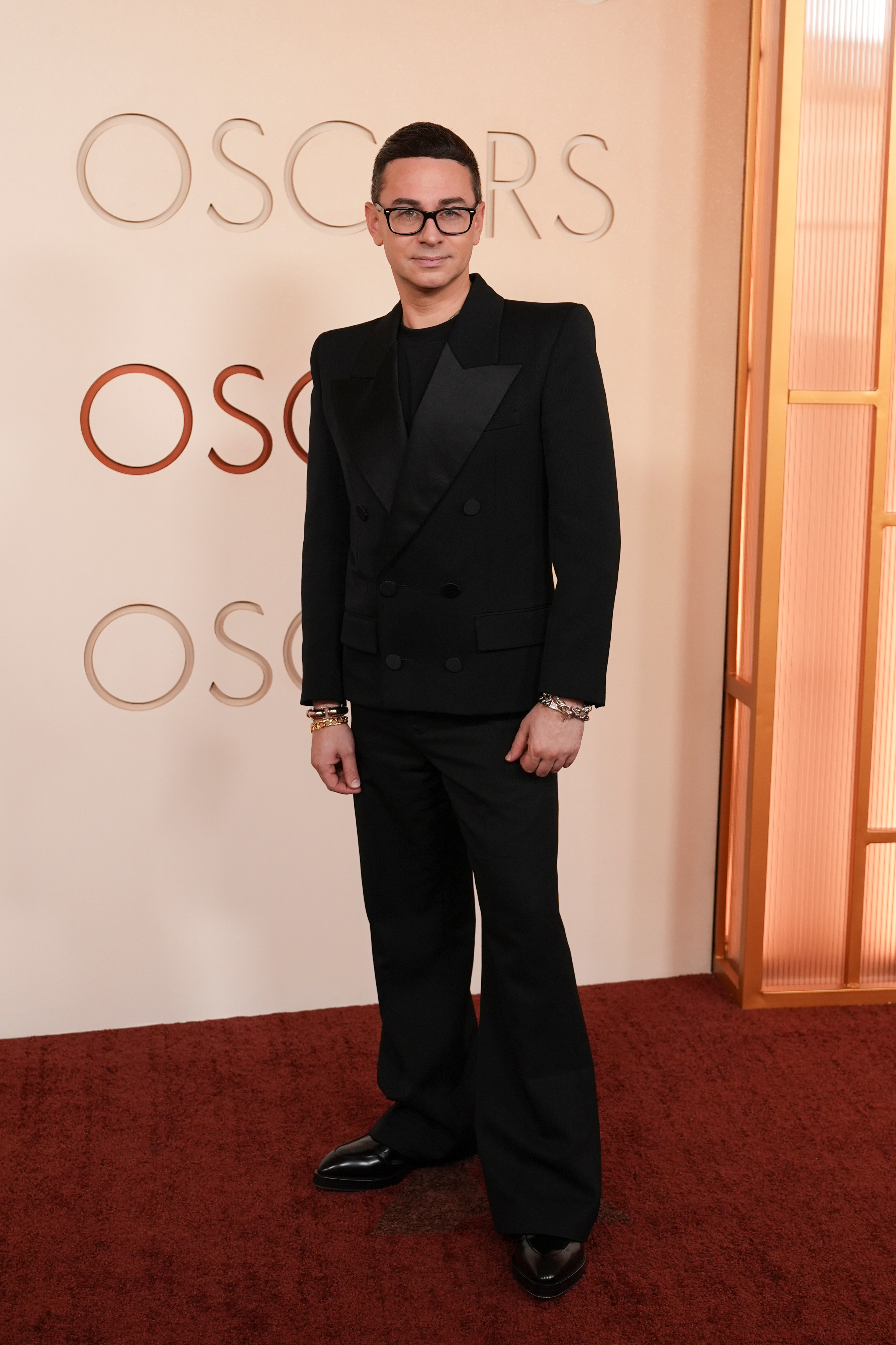 Christian Siriano arrives at the Oscars on Sunday, March 15,...