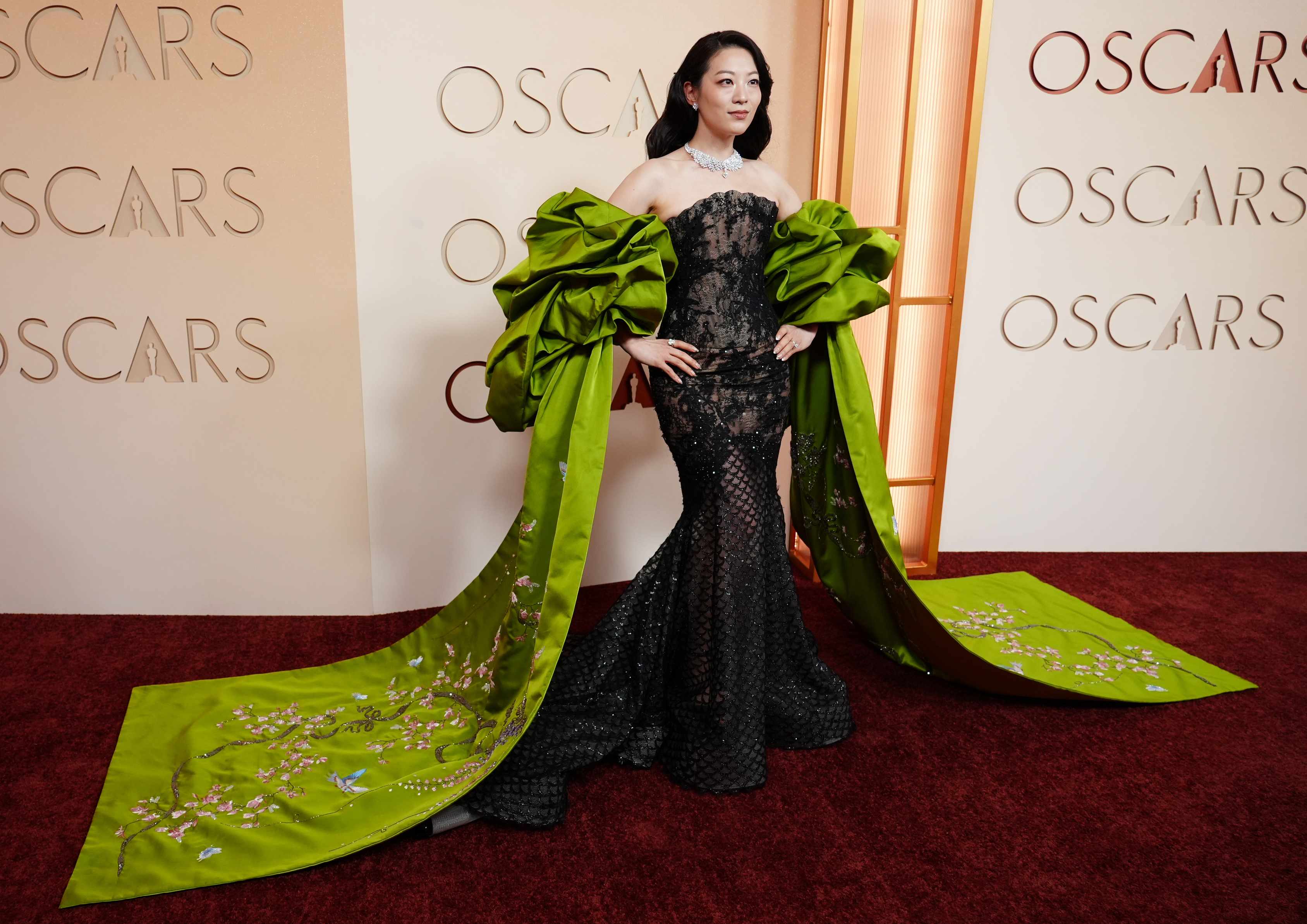 Arden Cho arrives at the Oscars on Sunday, March 15,...