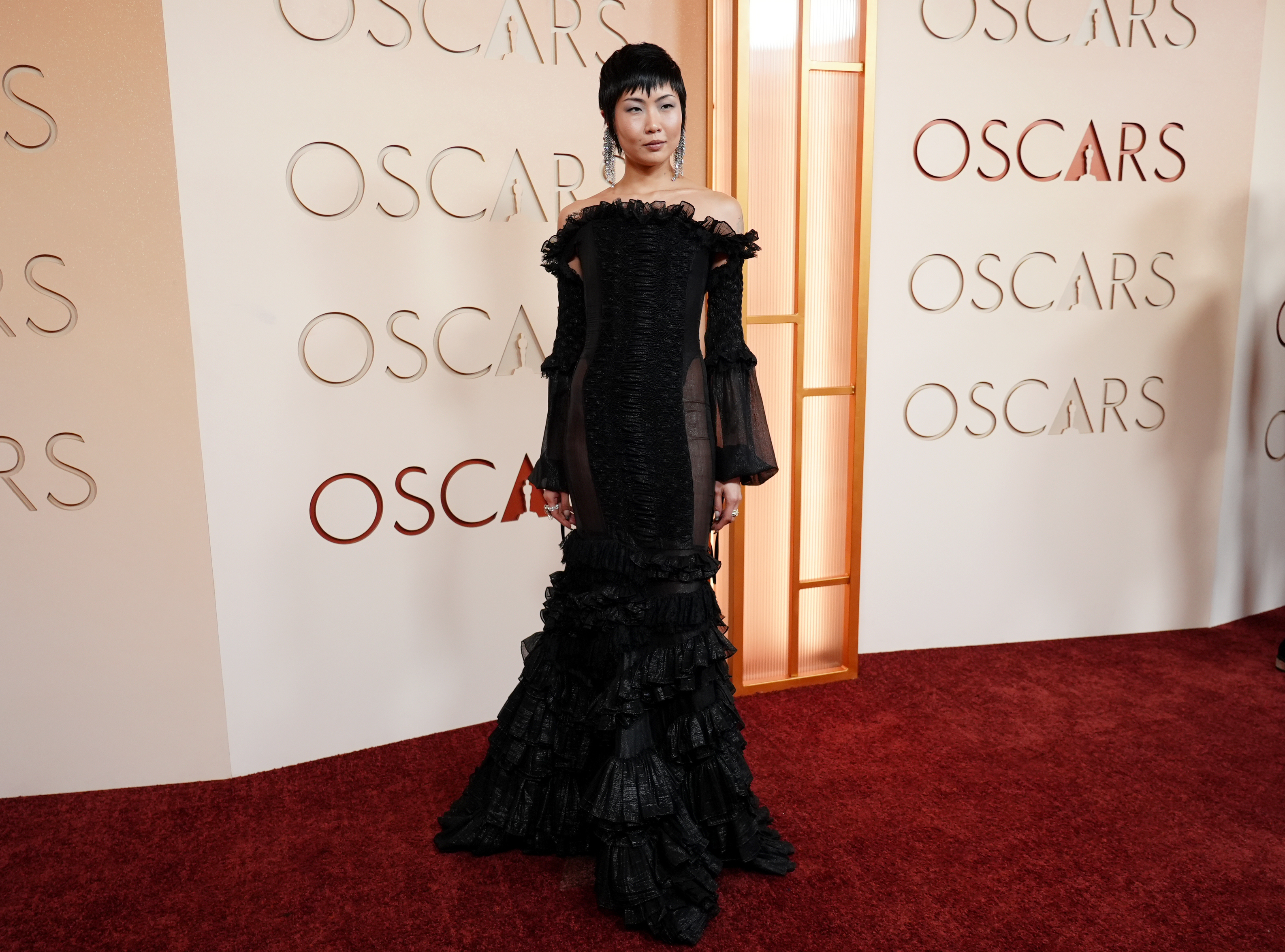 May Hong arrives at the Oscars on Sunday, March 15,...