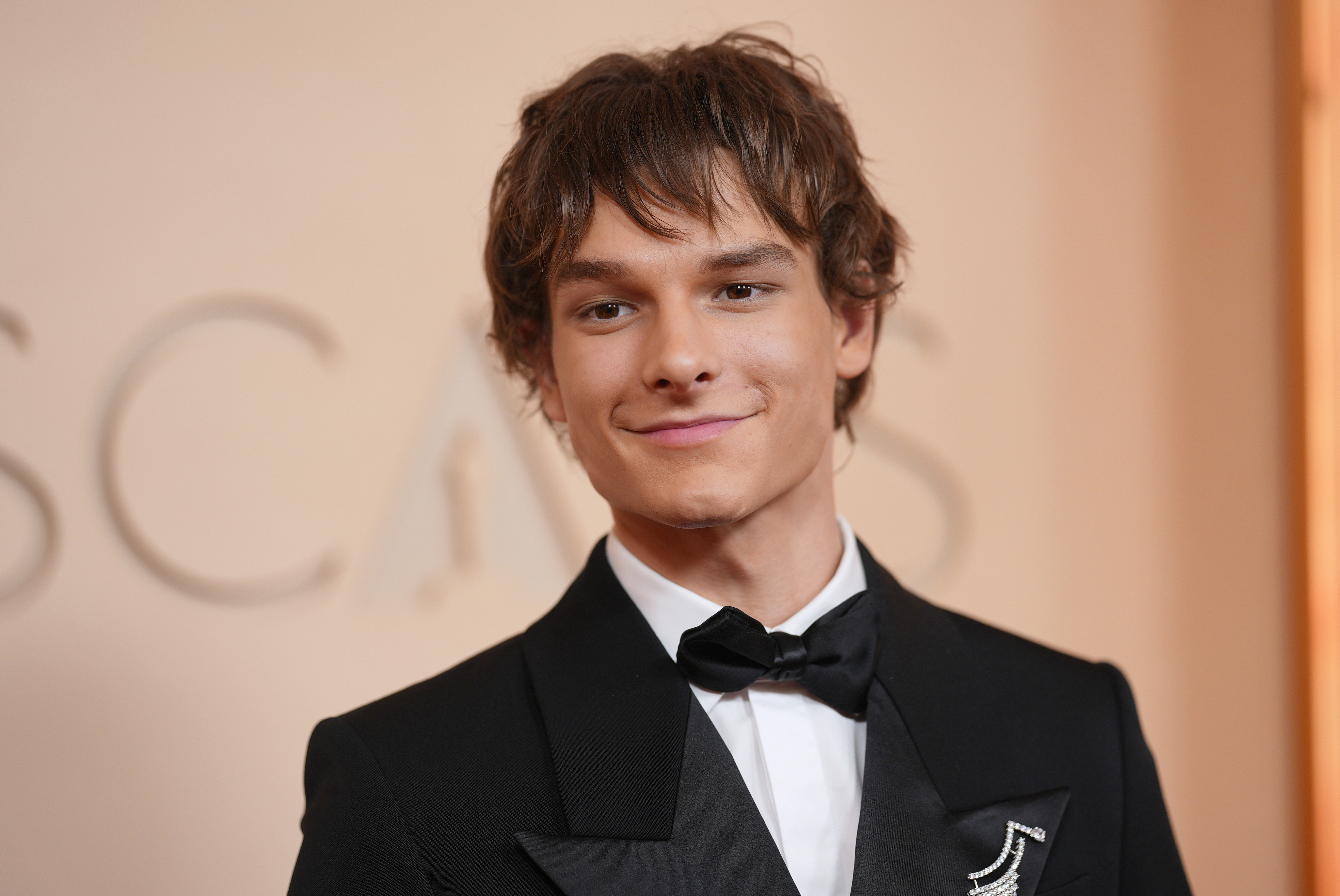 Mason Thames arrives at the Oscars on Sunday, March 15,...