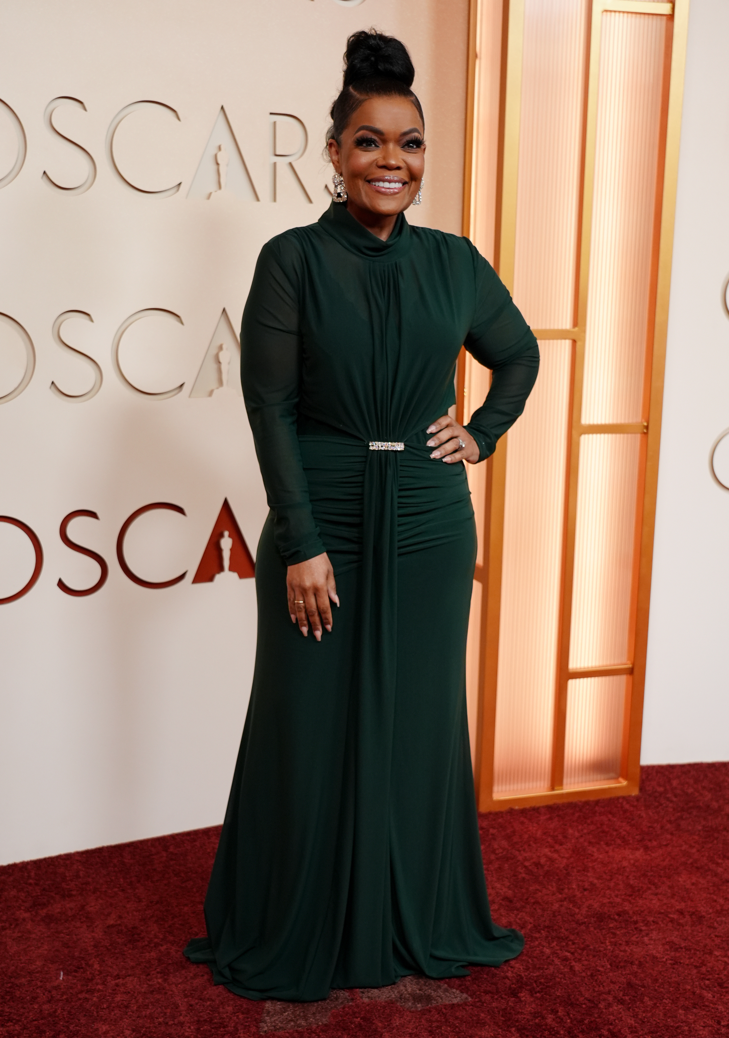 Yvette Nicole Brown arrives at the Oscars on Sunday, March...