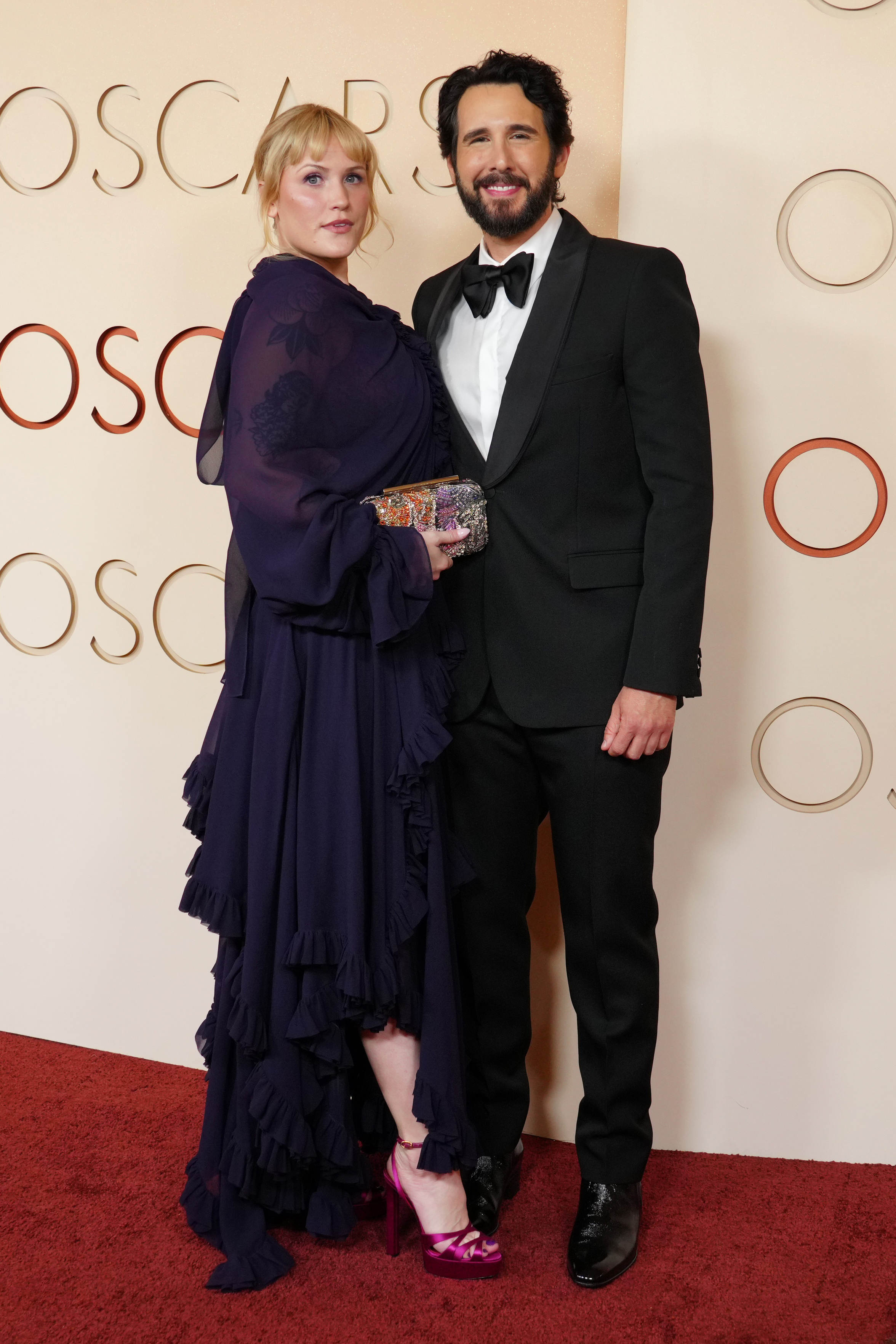 Natalie McQueen, left, and Josh Groban arrive at the Oscars...