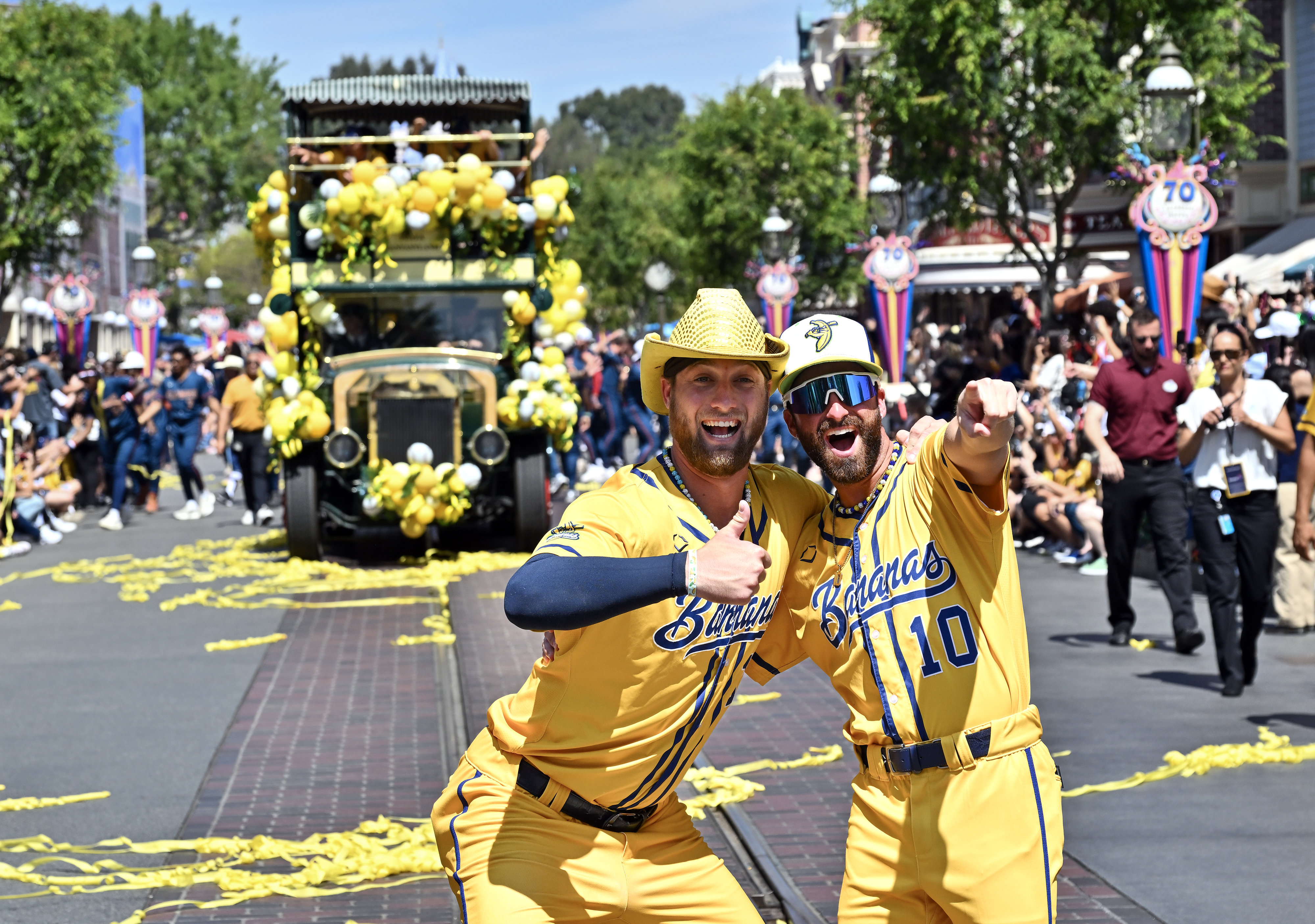 Savannah Bananas, pitcher Kyle Luigs (12) and infielder Alex “Ziggy”...