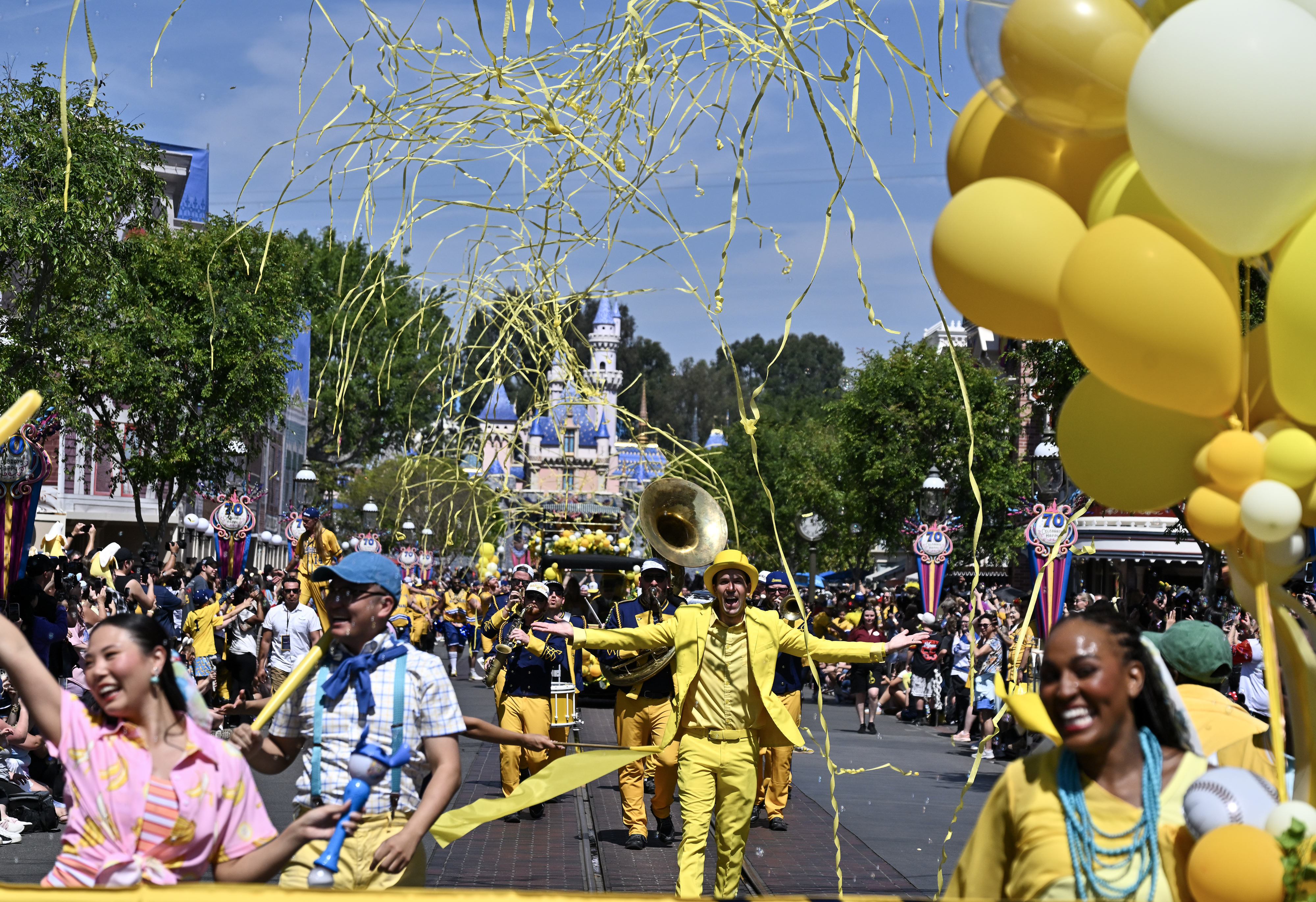 Jesse Cole, founder and owner of the Savannah Bananas, dances...