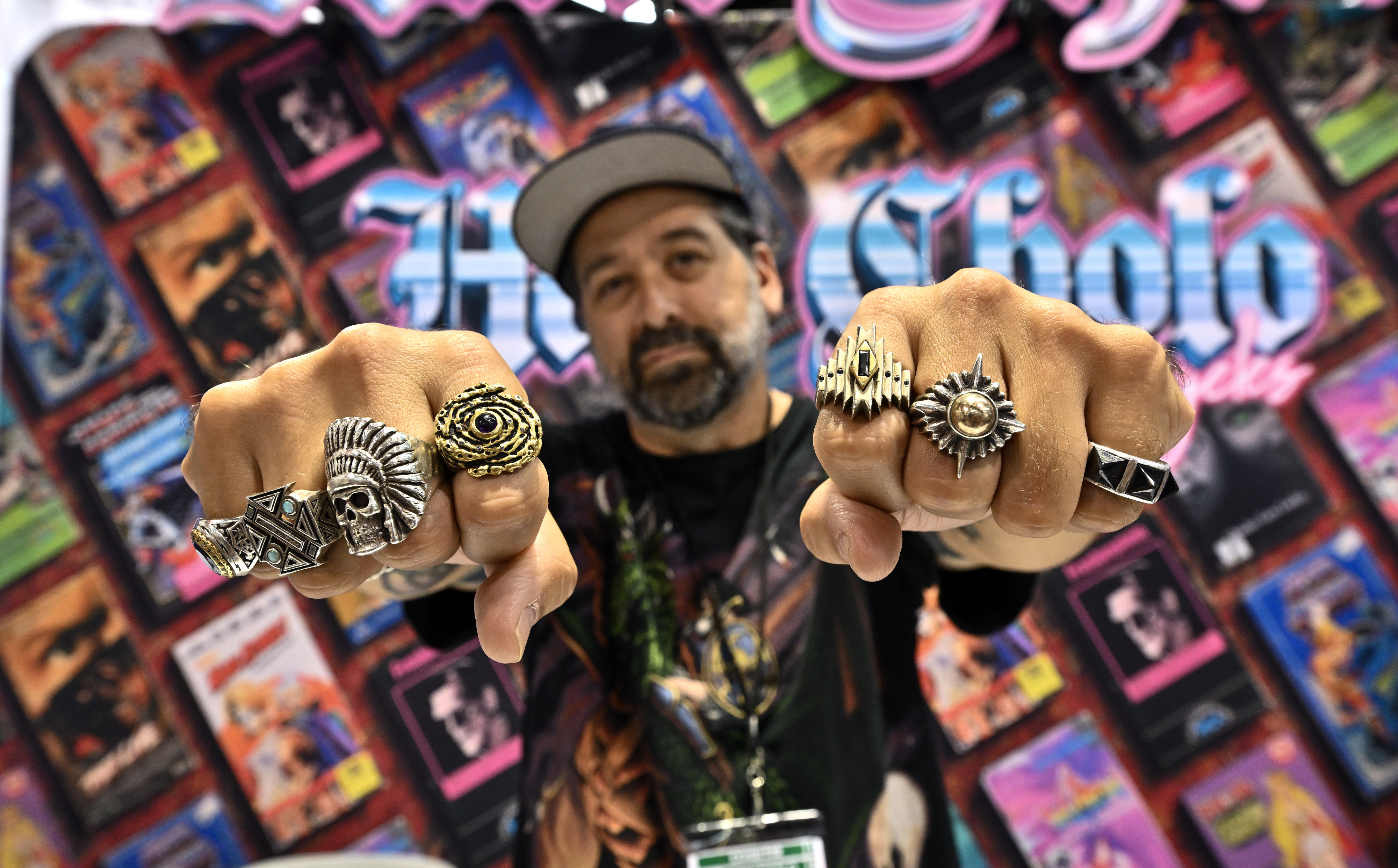 Brandon Schoolhouse, known as Han Cholo, shows off some of...