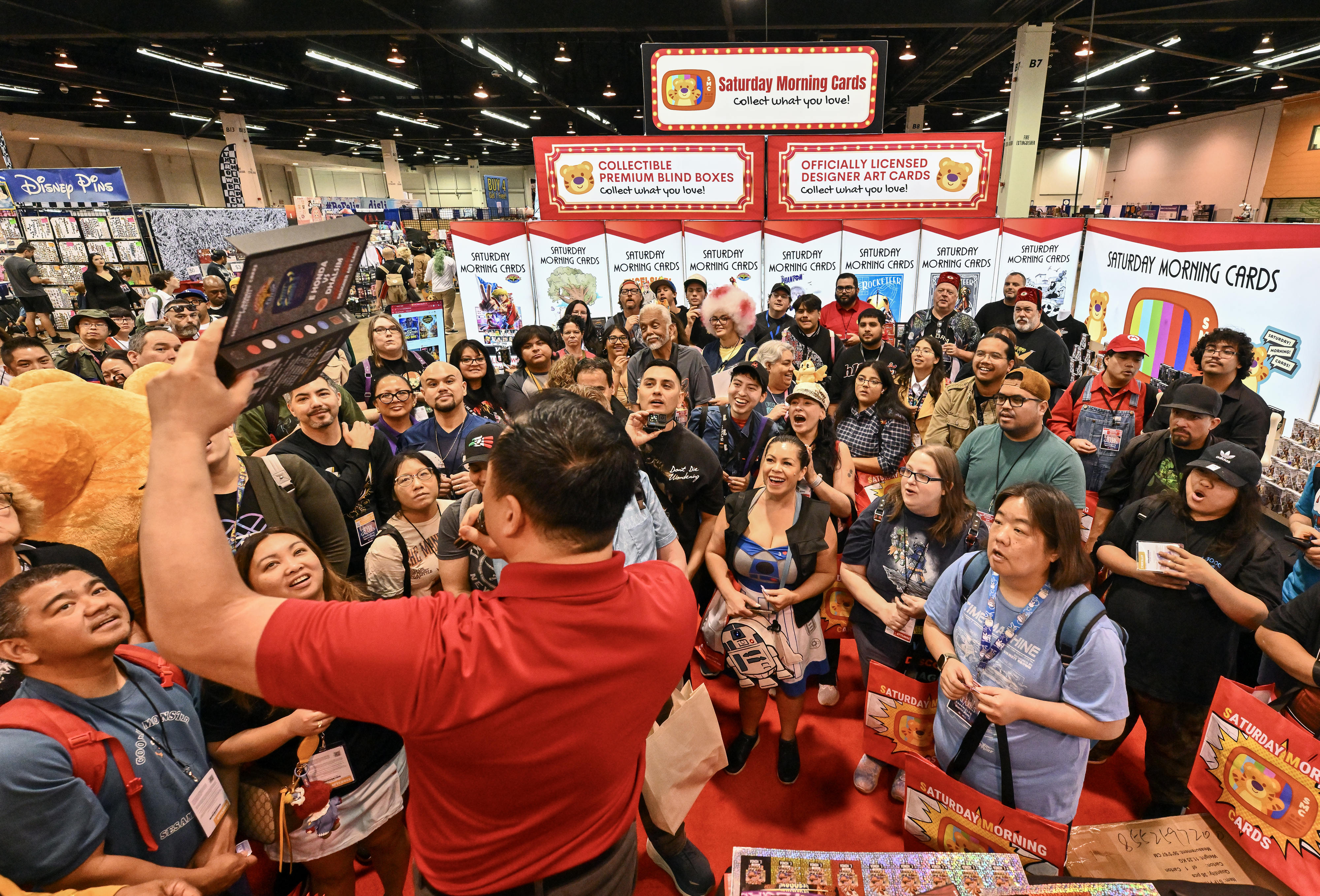 Daniel Nguyen raffles off products at his booth, Saturday Morning...