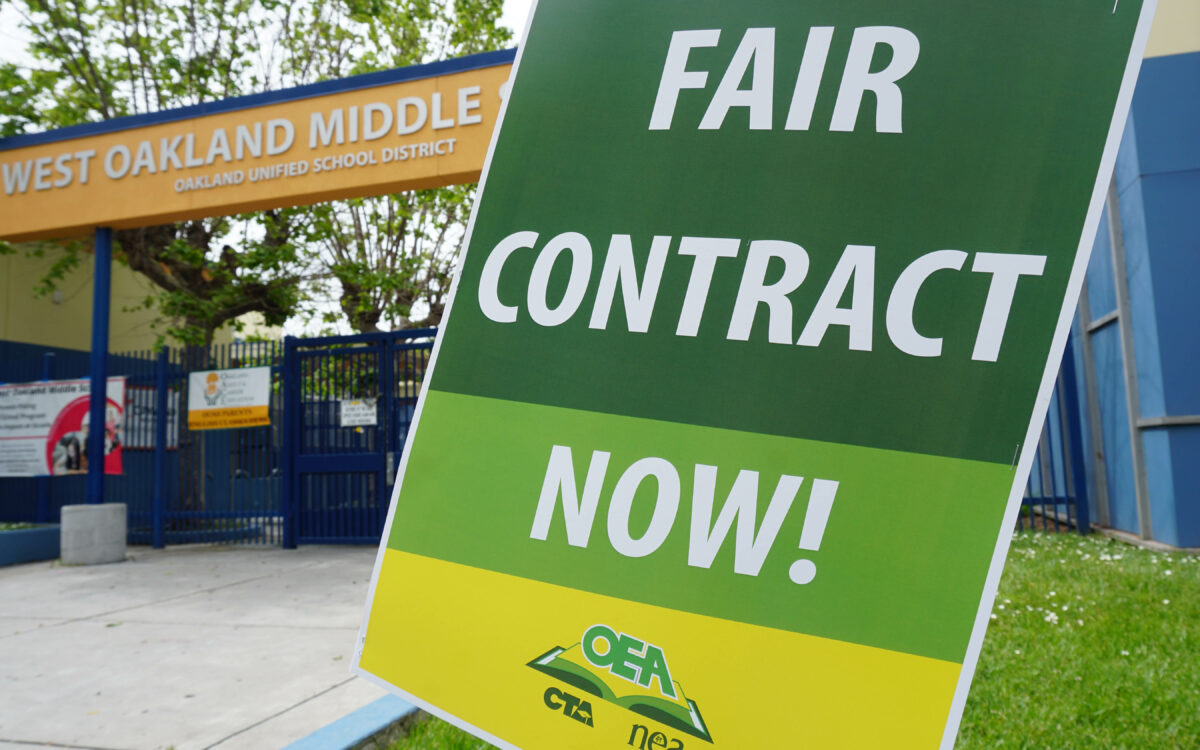 Oakland teachers reach tentative deal with district after year of talks, but layoffs loom