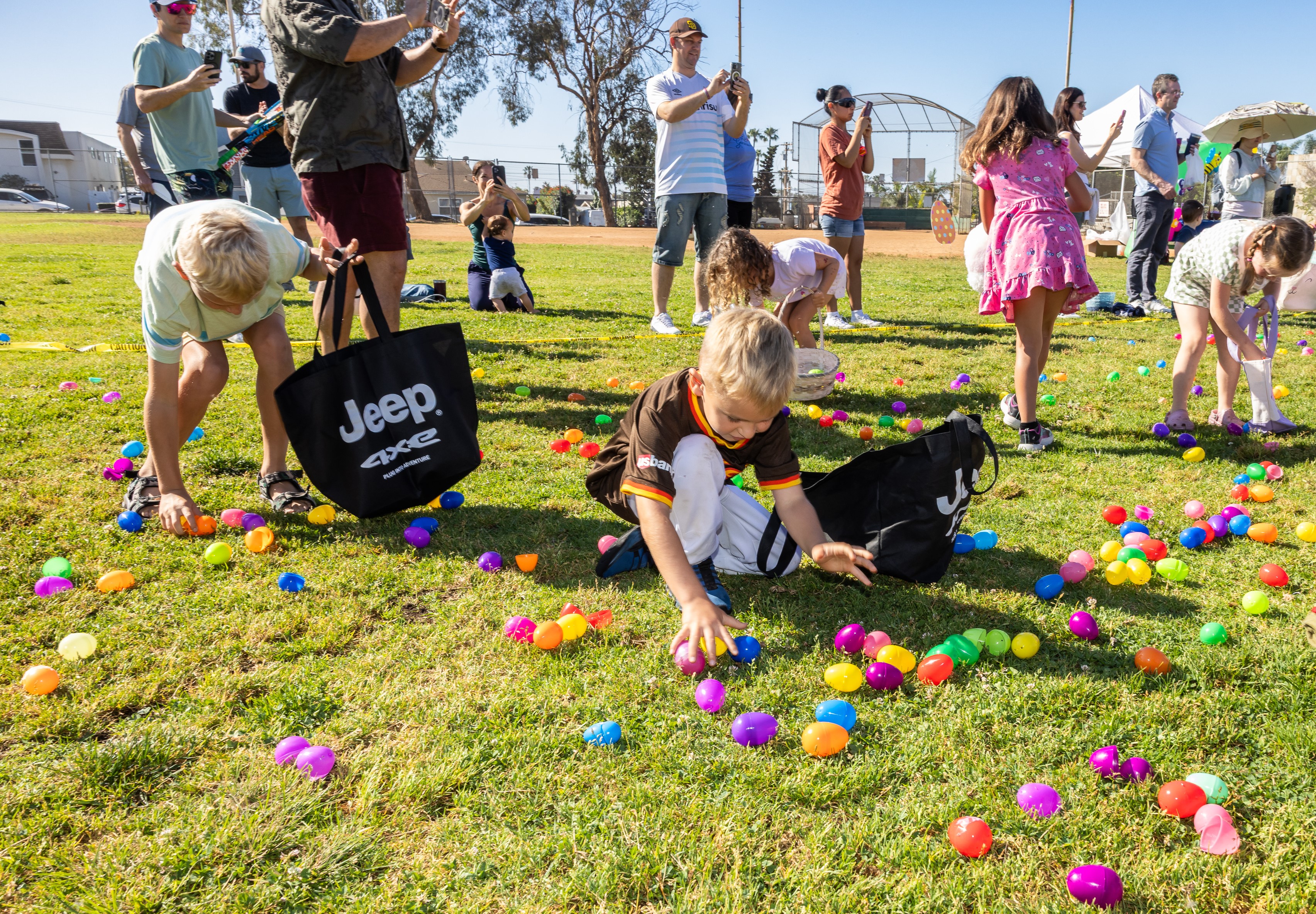 Children gathering eggs at the Pacific Beach Recreation Center egg...