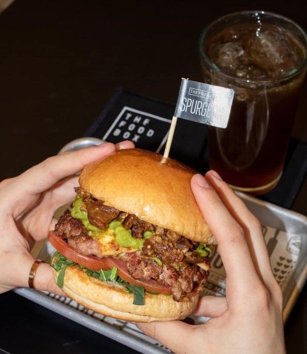 The Food Box hamburger, the Spurgeon, is described as "carne asada on a burger." (Courtesy of The Food Box)