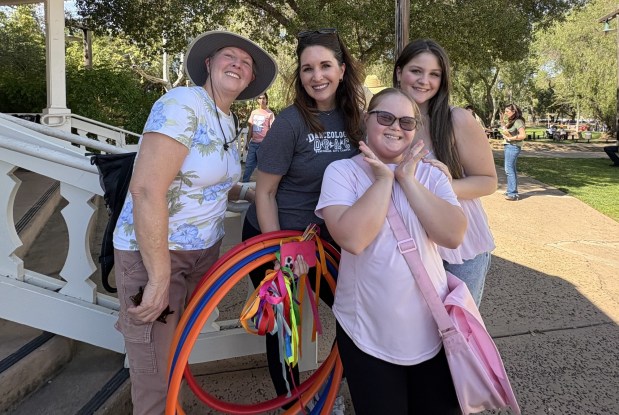 Gracie Farrow, in front, was among Danceology's adaptive dance program students who performed. She is with Katharine Farrow; program director Julia Pearson and dance teacher assistant Lucy Moss. (Amy Shireman)