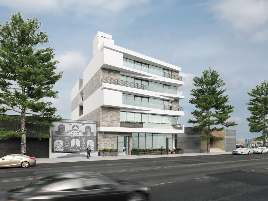 Mixed-use development with housing and new company headquarters rises across from the Culver City E line station