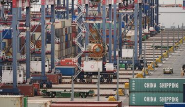 Containers are stacked at the Port of Long Beach Friday, Feb. 20, 2026, in Long Beach, Calif. (AP Photo/Damian Dovarganes)