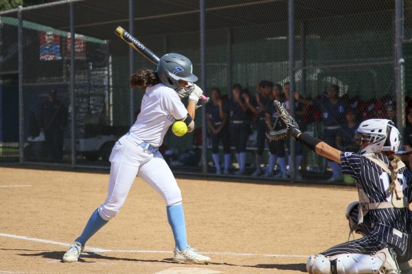 El Camino College's Jazmin McHenry, gets hit by a pitch in the bottom of the first inning, advancing to first base. She’s the first runner on base for El Camino. (Frances Que | The Union)