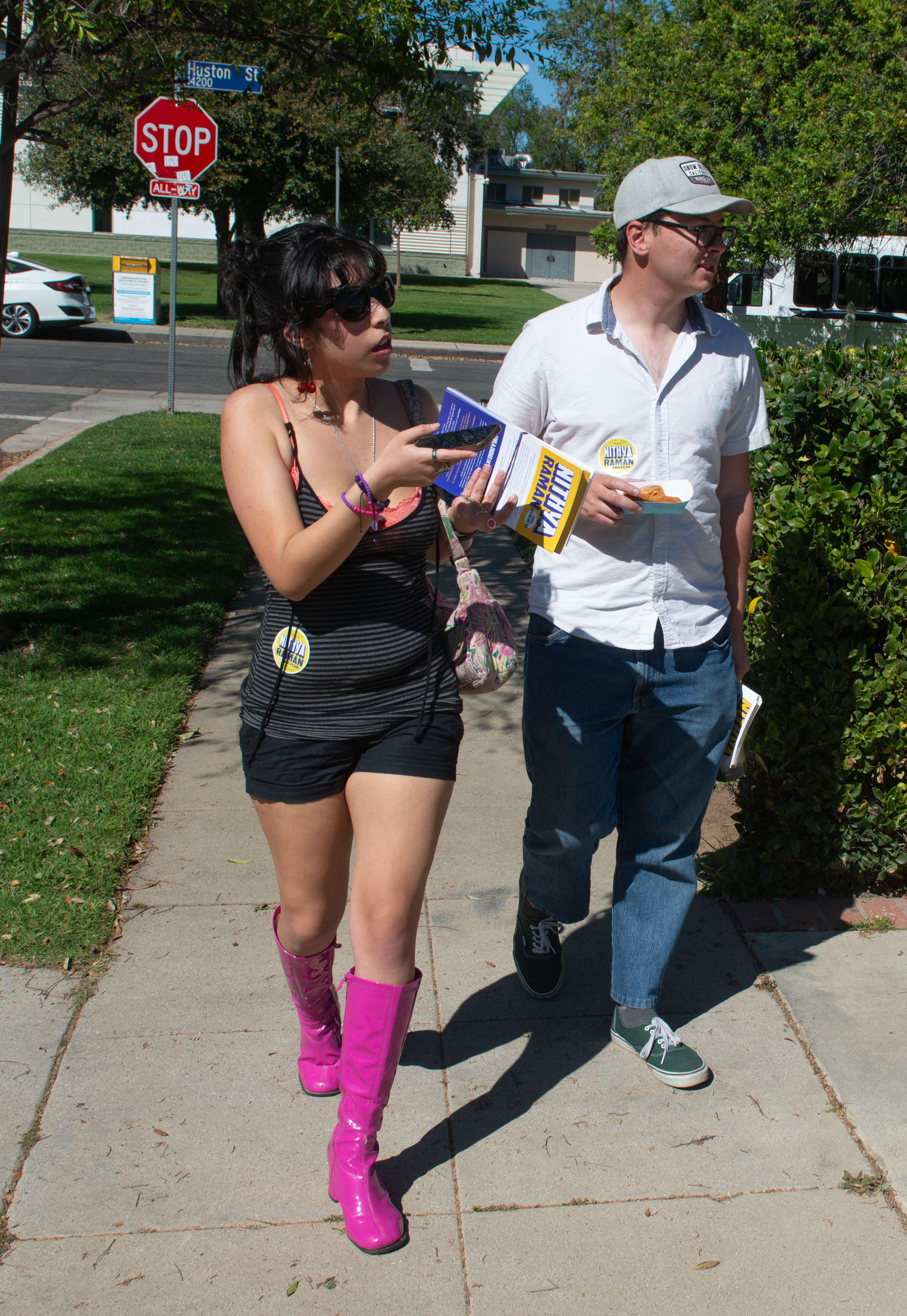 Gehena Rivera and Troy Davidson canvas the neighborhood across from...