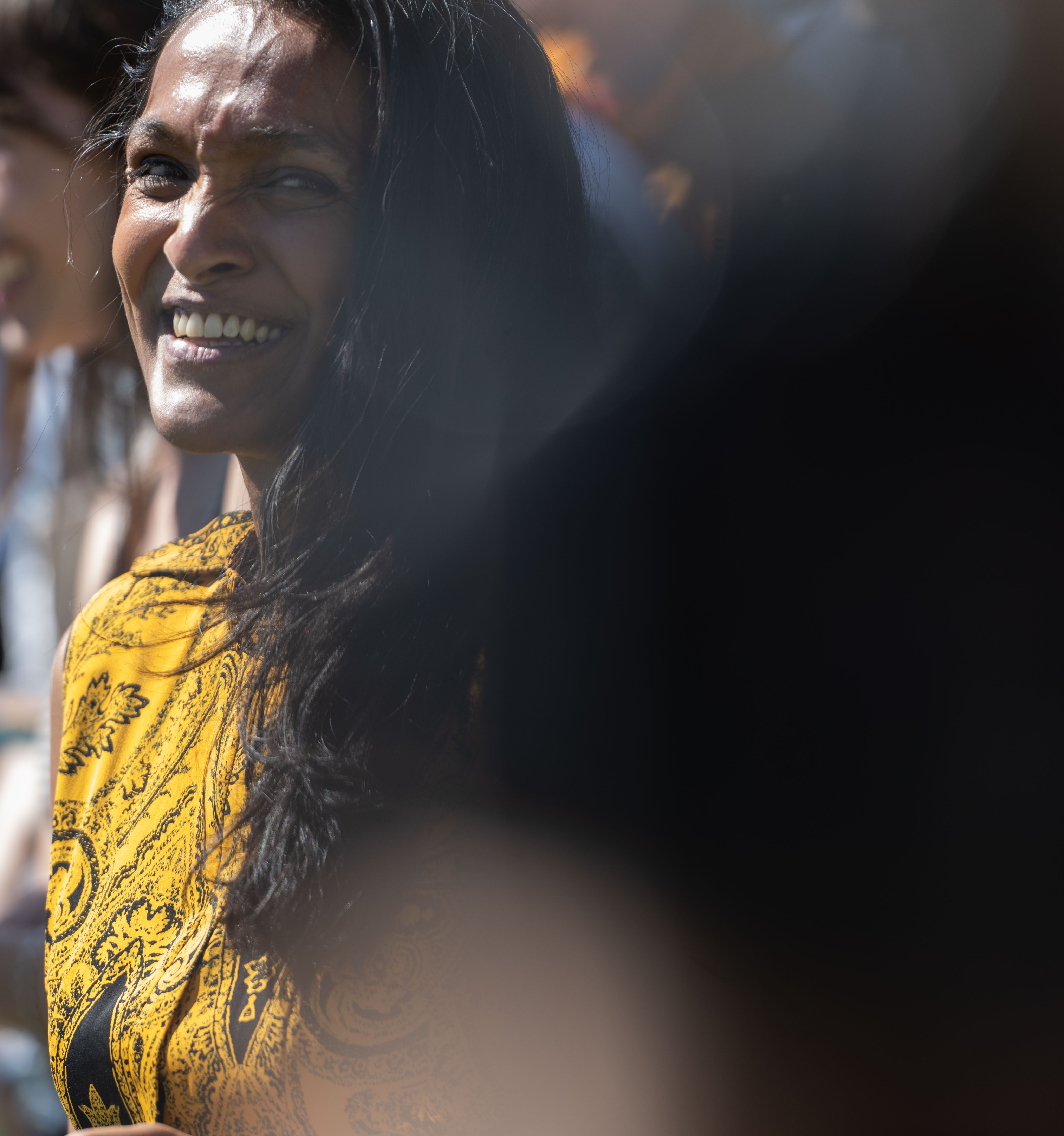 City Councilwoman Nithya Raman laughs as she is introduced at...