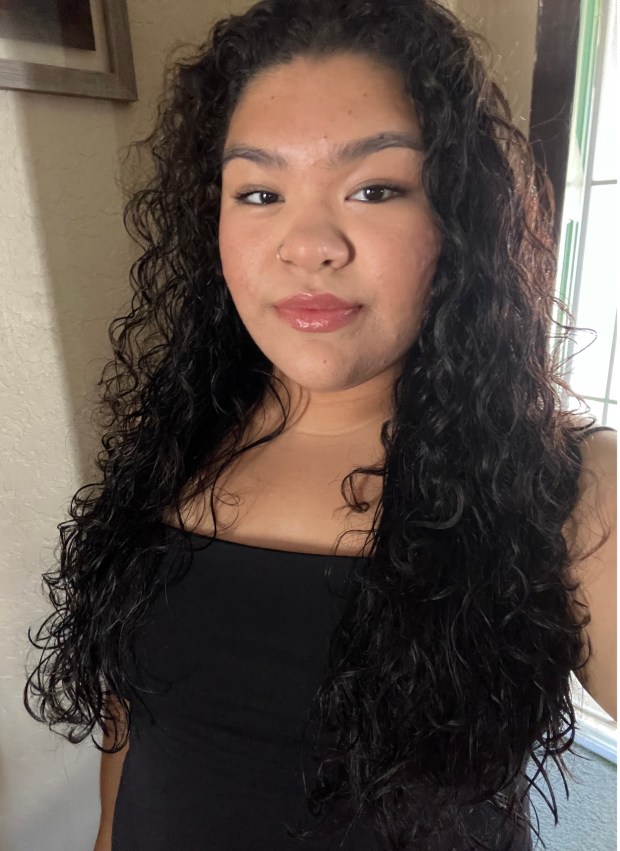 Maya Calvillo, an 18-year-old senior at Ramona High, created a colored pencil drawing that shows a woman and her daughter buying produce at a farmers market. (Courtesy Maya Calvillo)