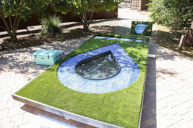 Hague Quality Water built their miniature golf course to resemble the quality of water they strive to provide their customers. Inside the inner droplet, goldfish were added for the kids to enjoy. (Stephanie Ogilvie)