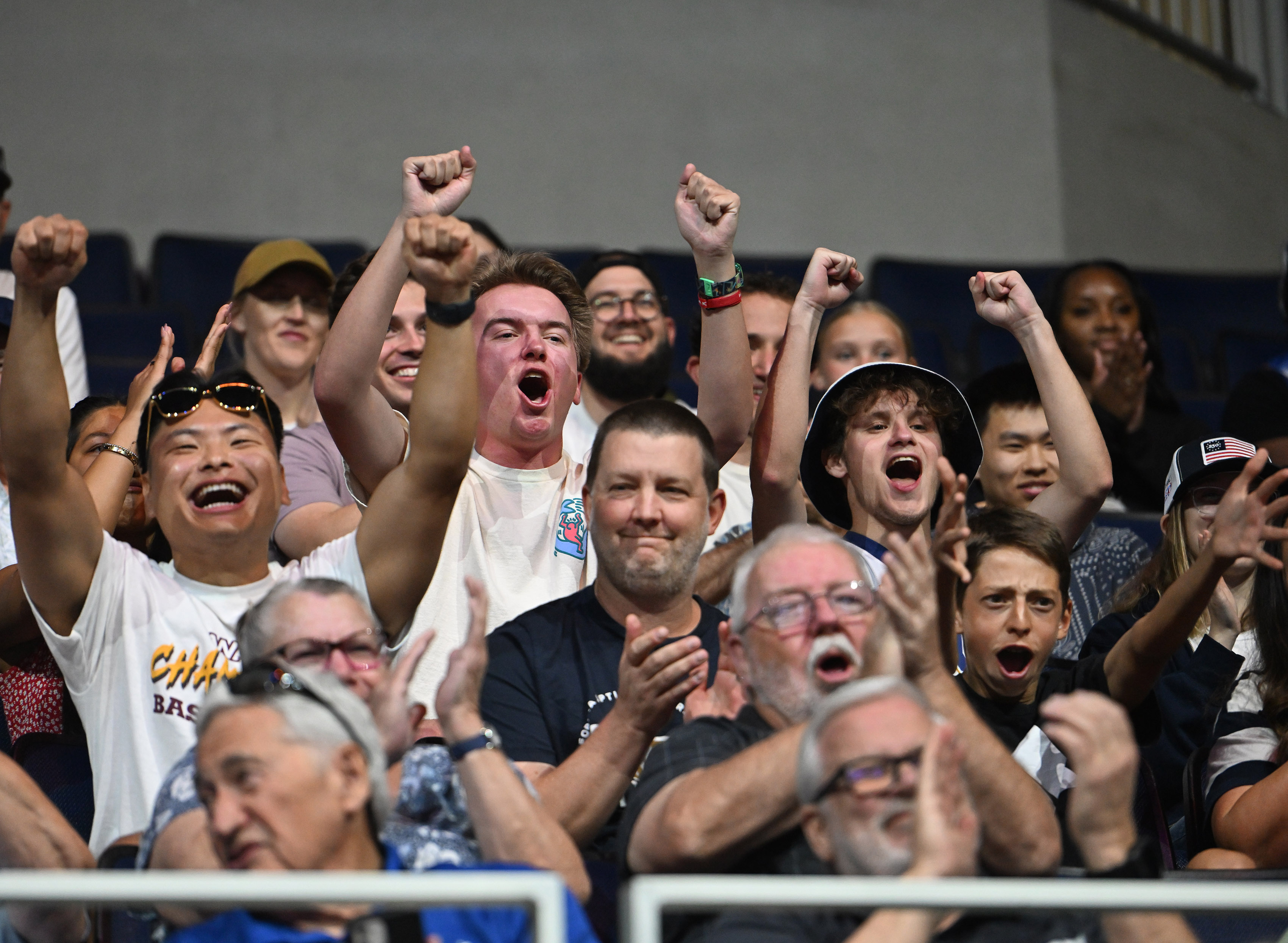 California Baptist University women’s team supporters cheer during a watch...