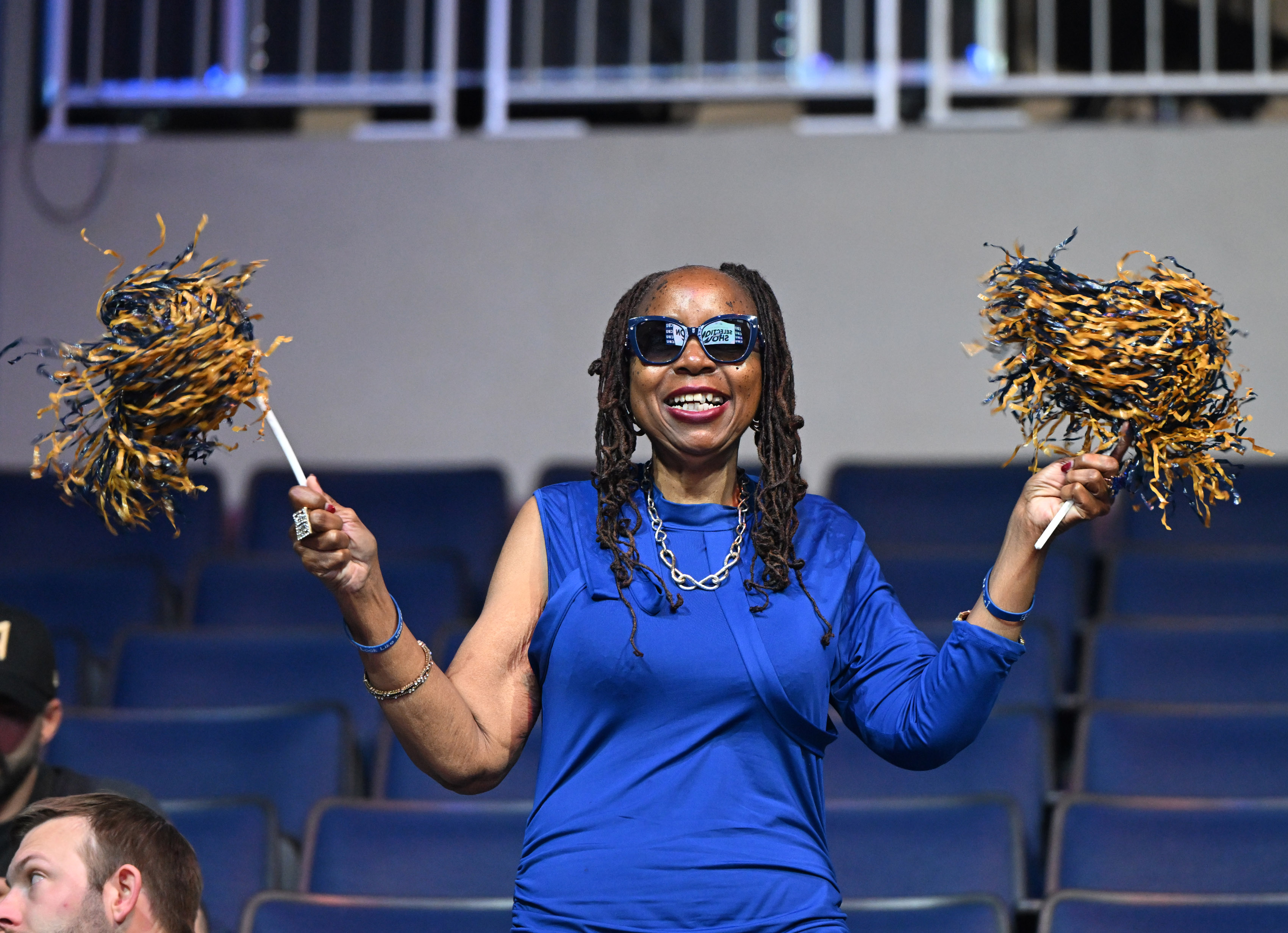 California Baptist University women’s team supporter Patricia Edwards cheers during...