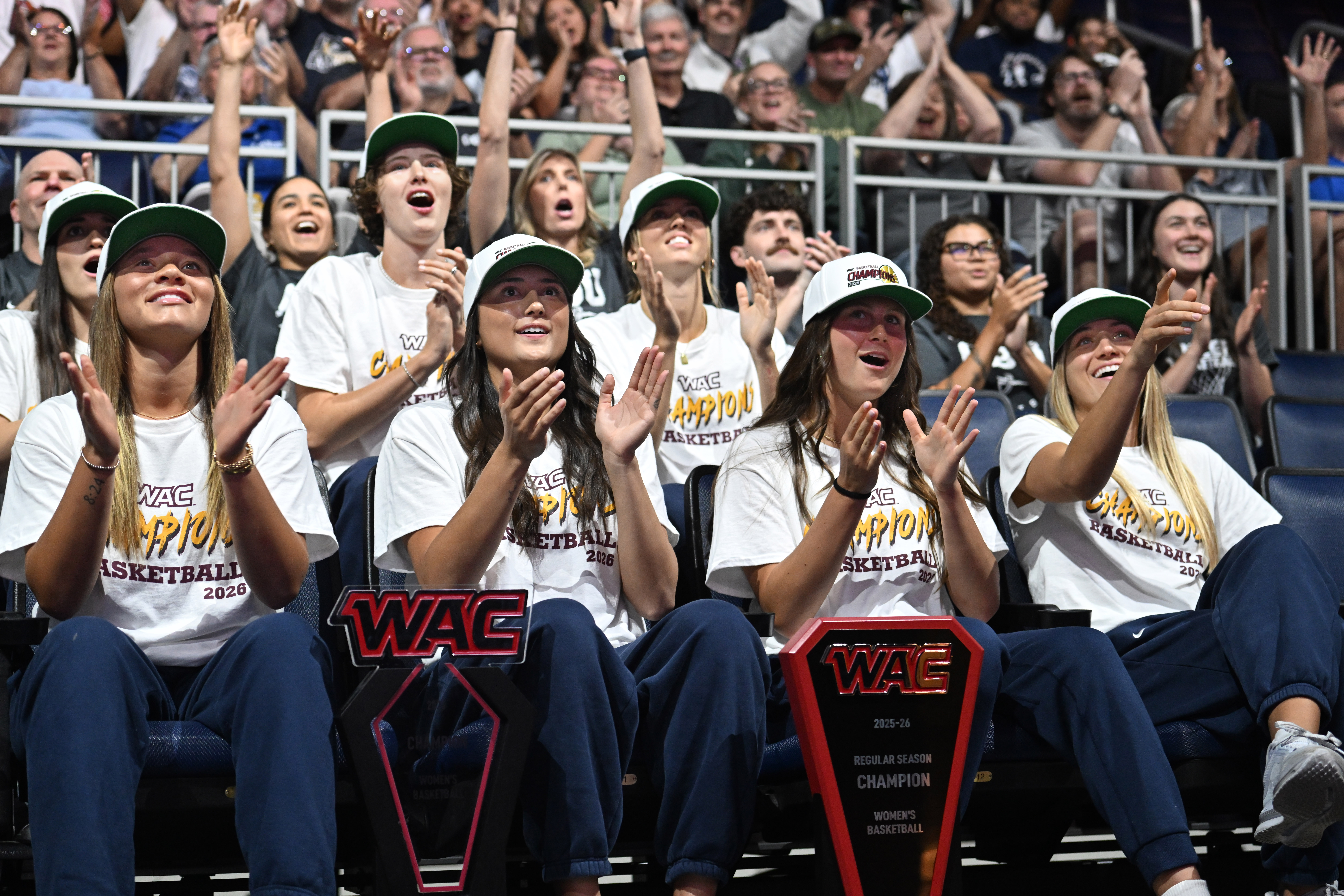 California Baptist University women’s players react during a watch party...