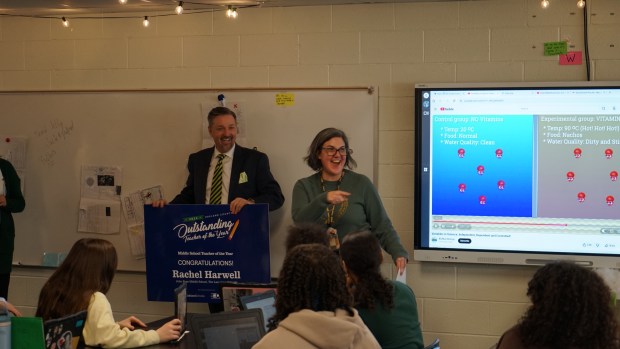 Rachel Hartman was the first teacher to get a visit from Gutman on Tuesday morning when he showed up in her classroom to present her with the Teacher of the Year award in the middle school category.Phot courtesy Oakland ISD