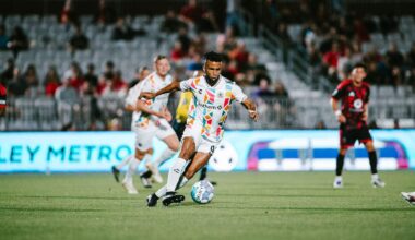 Alameda Post - An Oakland Roots player dribbles the ball in a match against Phoenix Rising.
