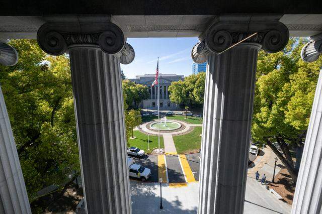 The Stanley Mosk Library and Courts Building is seen through the pillars of the Jesse M. Unruh Building in Sacramento earlier this month. Reopening after a multi-year $169 million rehabilitation, the 1928 building houses the state Treasurer's Office.