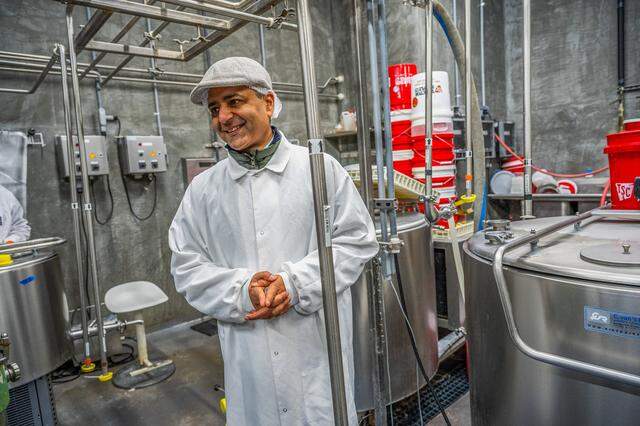 Abhinav Anand, founder of Just Creamery, shows an area where milk is pasteurized in vats inside his production facility on Wednesday, Feb. 18, 2026, in Wilton. Just Creamery is a finalist for the Good Food Awards. Originally from India, he said he wanted the cheeses he craved from home, which is why he founded the company.