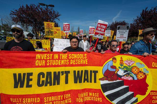 Union leaders and supporters join in a march for the first ever Natomas educators strike at North Natomas Regional Park in Sacramento on Tuesday, March 10, 2026.
