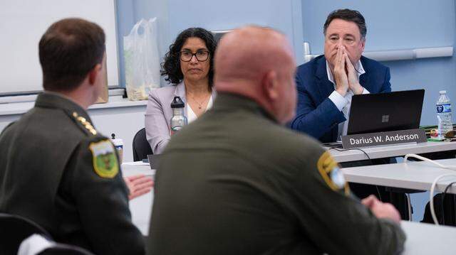 California Fish and Game commission member Darius W. Anderson, right, listens to testimony during a public meeting in May. The longtime lobbyist has been accused of fraud by his business partner Ron Burkle, who filed suit against Anderson last month. 