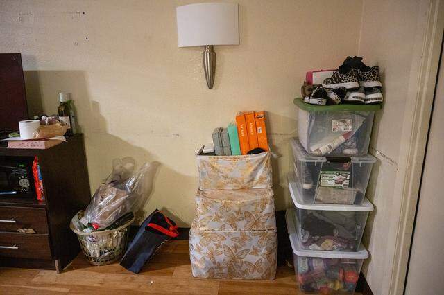 The possessions of Jessica Rose and her daughter, Faith, are stored in a corner of their hotel room in Rancho Cordova Jan. 21. Rose says her car had been stolen outside the Outreach and Engagement Center shelter, and she had no other way to store or transport her belongings.