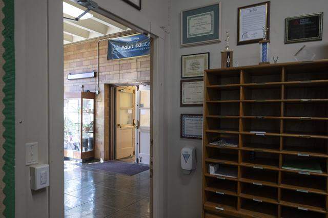 The office and hallway at A. Warren McClaskey Adult Center in East Sacramento on earlier this month. The building, which now serves as an adult education center, will be shuttered later this year.