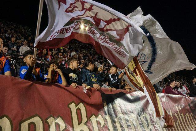 Kids wave the Tower Bridge Battalion flag behind the east goal in the second half in the soccer game between FC Tulsa and the Republic FC on Saturday, March 7, 2026, at Heart Health Park in Sacramento.