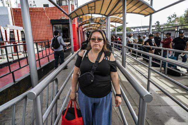 Maria de Jesus Estrada Juarez walks toward the San Ysidro pedestrian crossing on Monday, March 30, 2026, seeking to reenter the United States. She was held for hours at the port of entry before Immigration and Customs Enforcement granted her humanitarian parole under a federal court order.