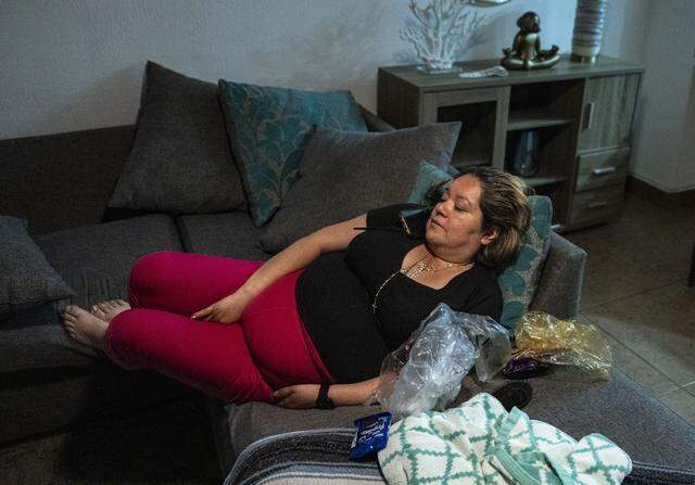 Maria de Jesus Estrada Juarez, a DACA recipient who was deported in February, talks on the phone with her mother at a home in Puebla, Mexico, on Sunday, March 29, 2026, as she waits for confirmation that she can return to Sacramento.