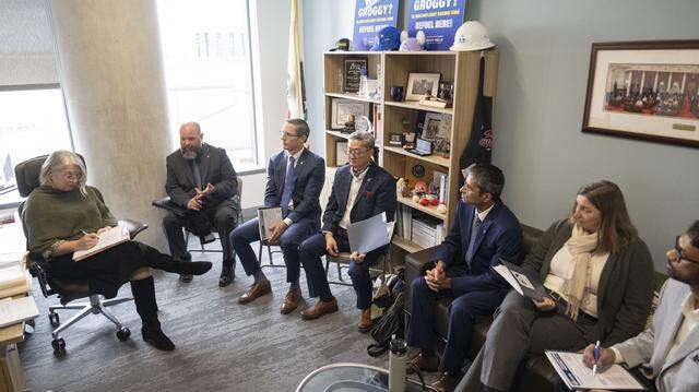 Members of the Professional Engineers in California Government labor union speak about a telework bill with Julie Sauls, chief of staff for California Sen. Roger Niello, at the Capitol Swing Space in Sacramento on Wednesday, Feb. 11, 2026. 